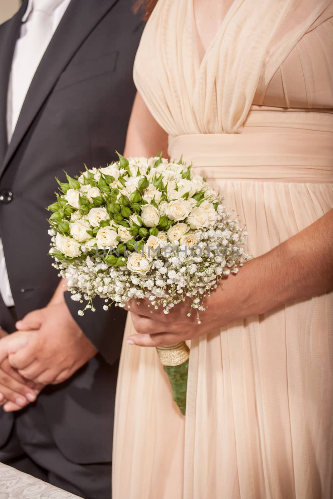 bride hold wedding bouquet