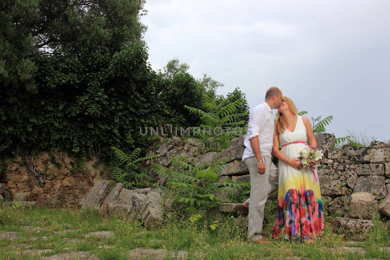 portrait of a young couple in a garden