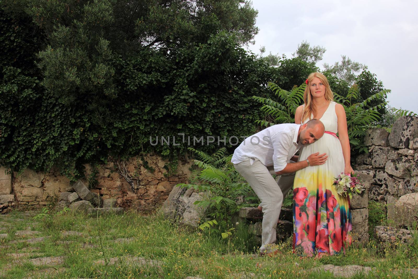 portrait of a young couple in a garden