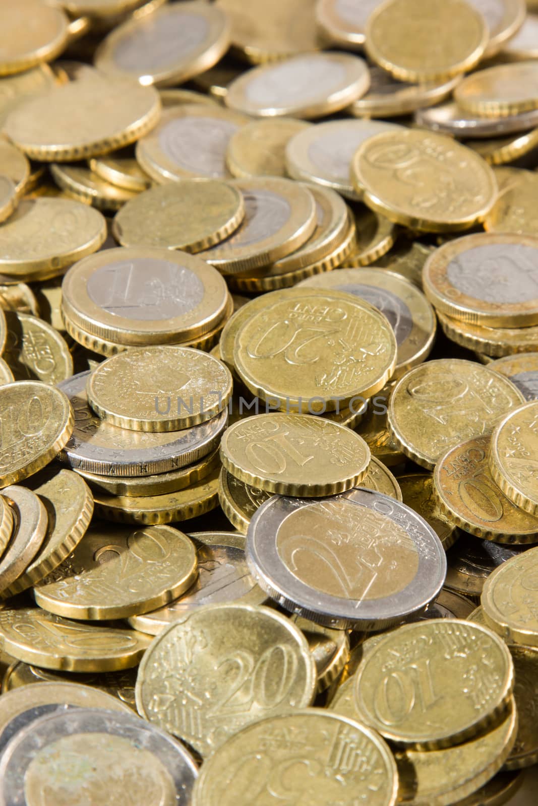 heap of euros coins isolated on a white background