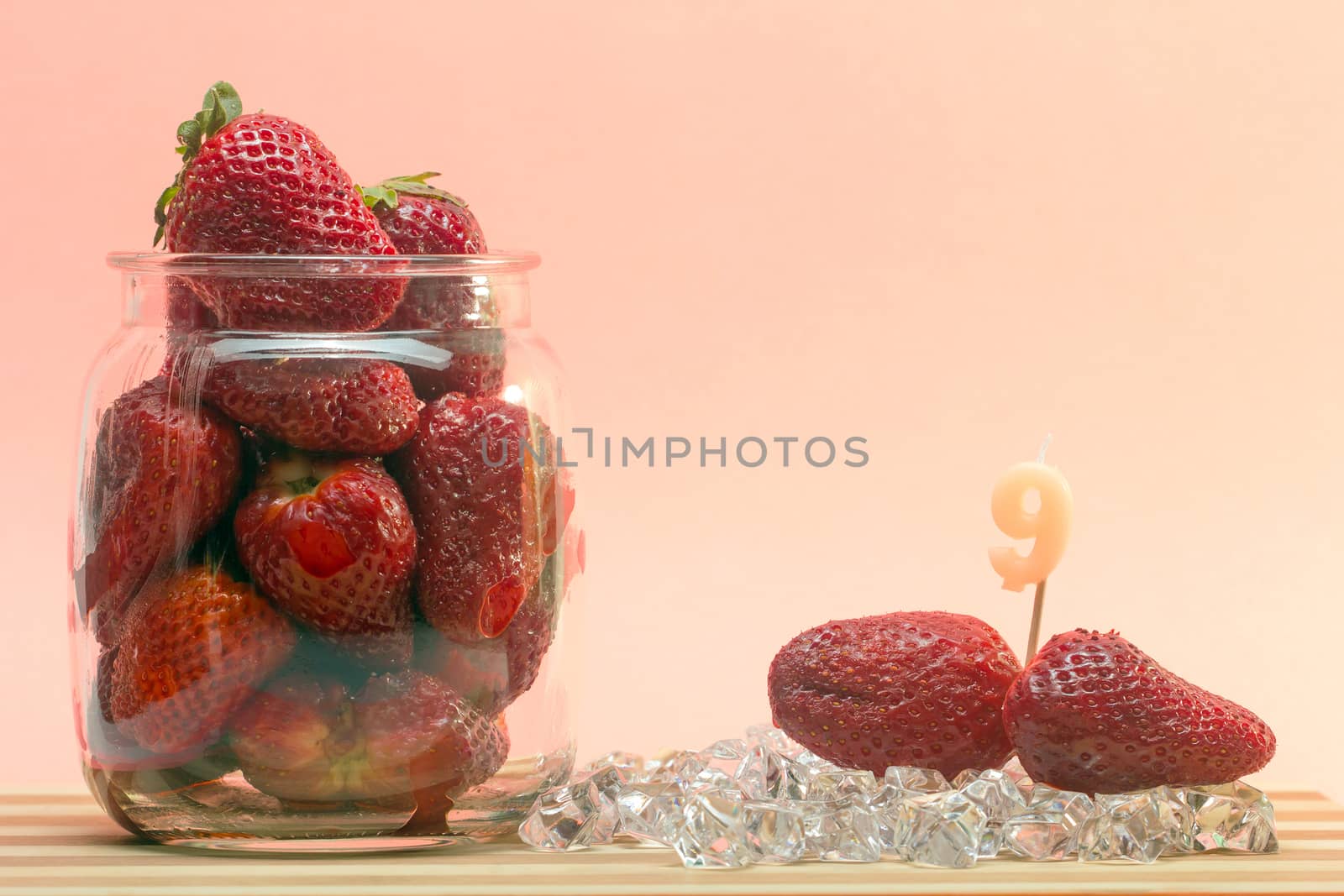 fresh strawberries with birthday candles sticks