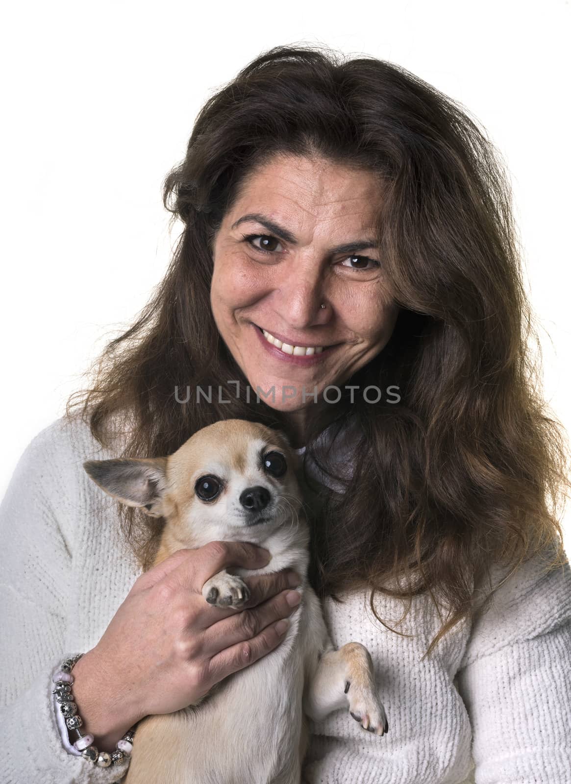 woman and chihuahua in front of white background