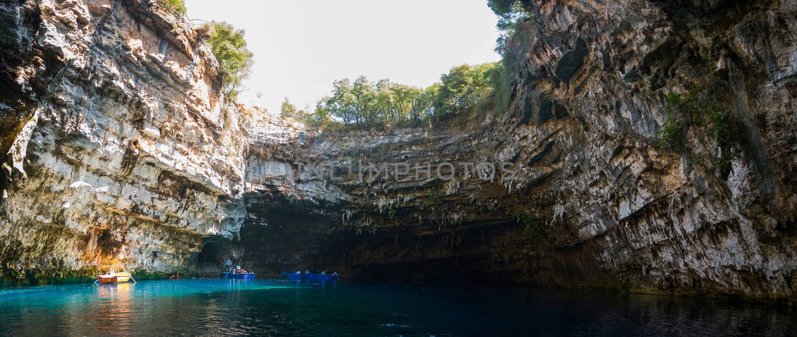 tourists from europe enjoy the atmosphere of this unique cave called melissani in the island of kefalonia, August 1st 2015, Greece