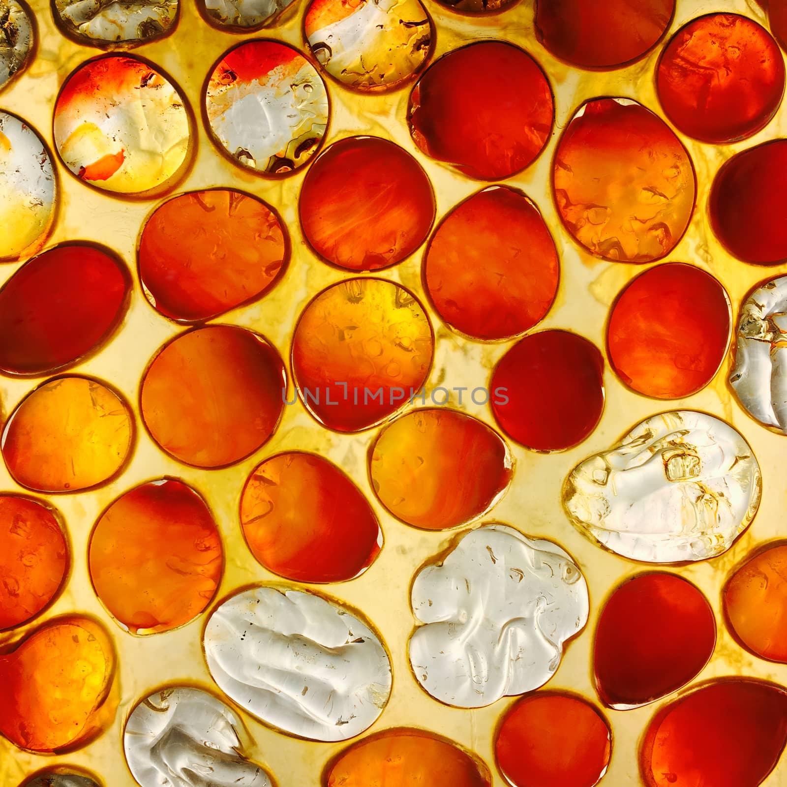 Background made of semi-transparent red and orange decorative glass.