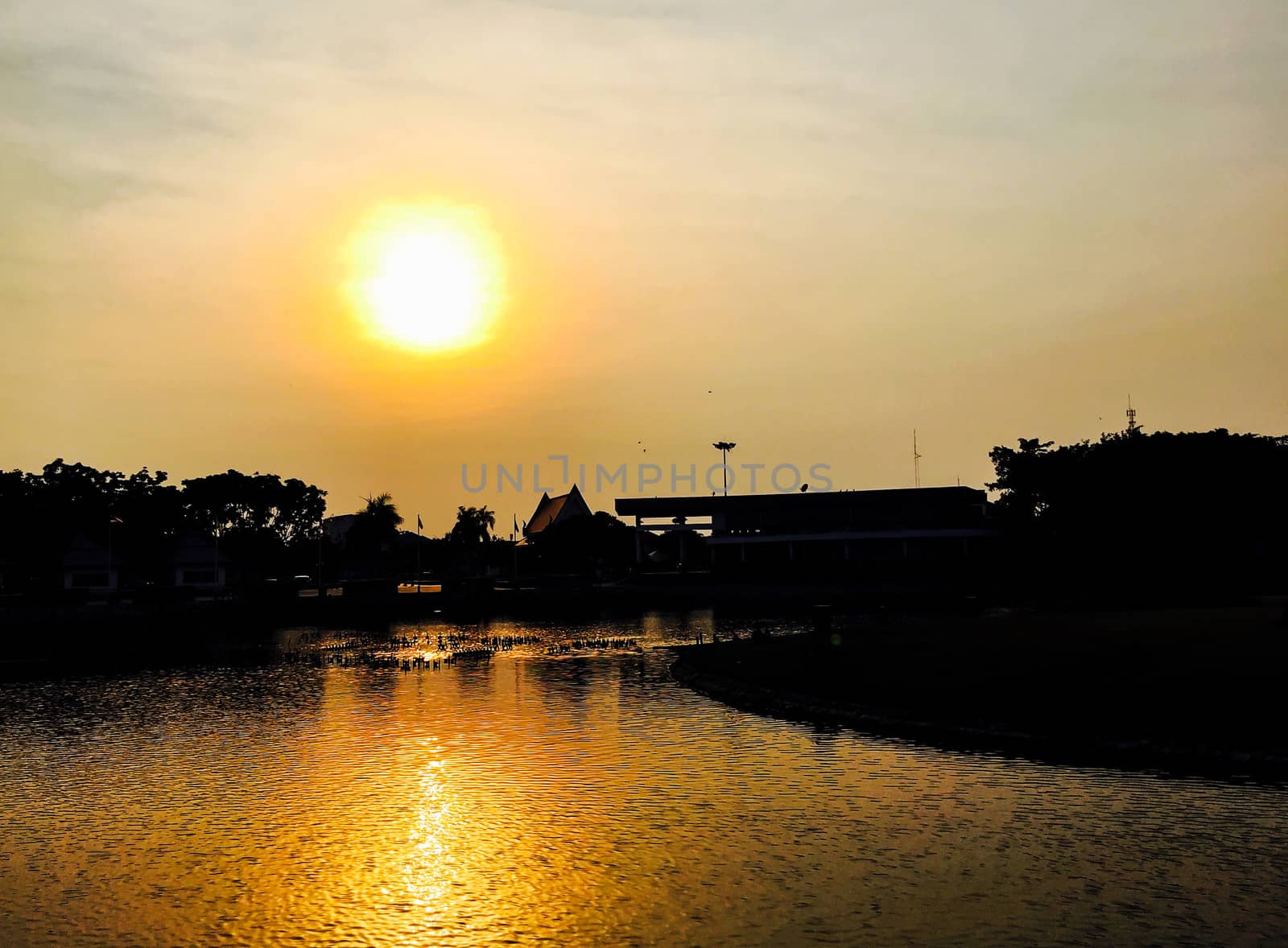 Beautiful sunset and reflect on the lake in evening