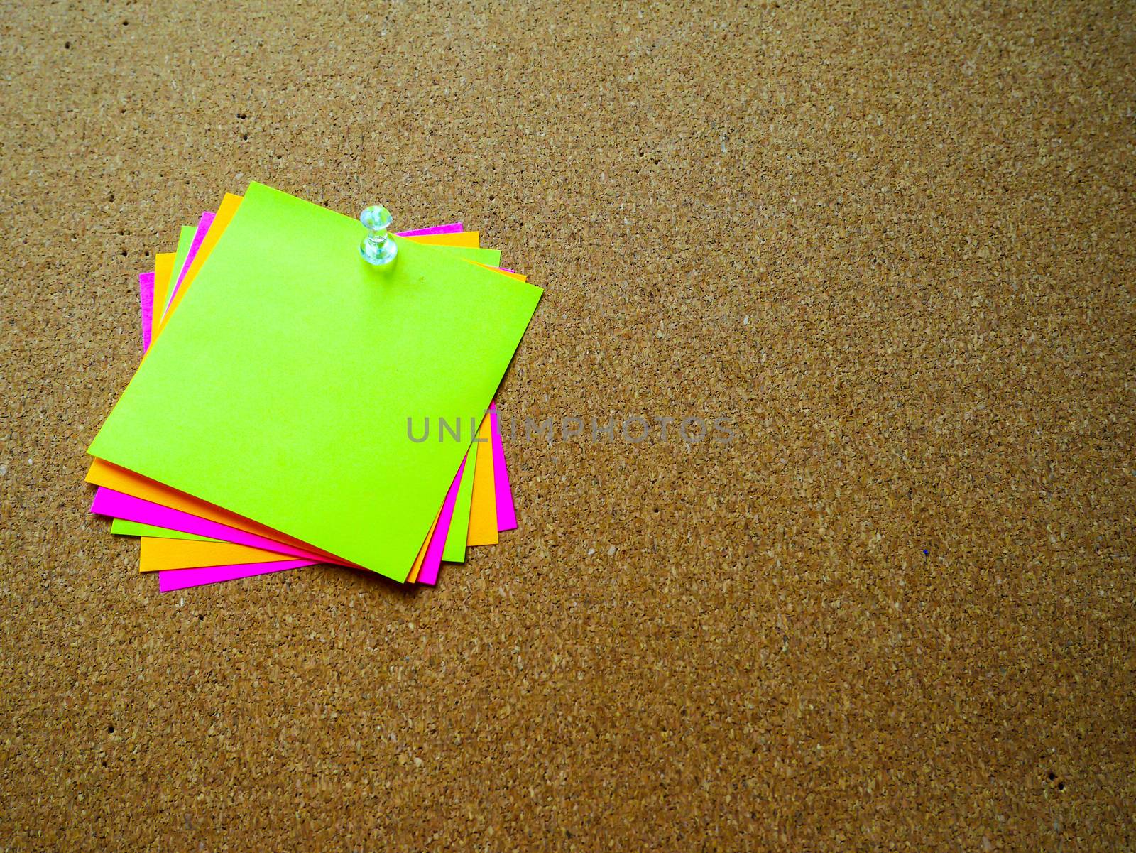 Colorful post it note on wood board with copy space