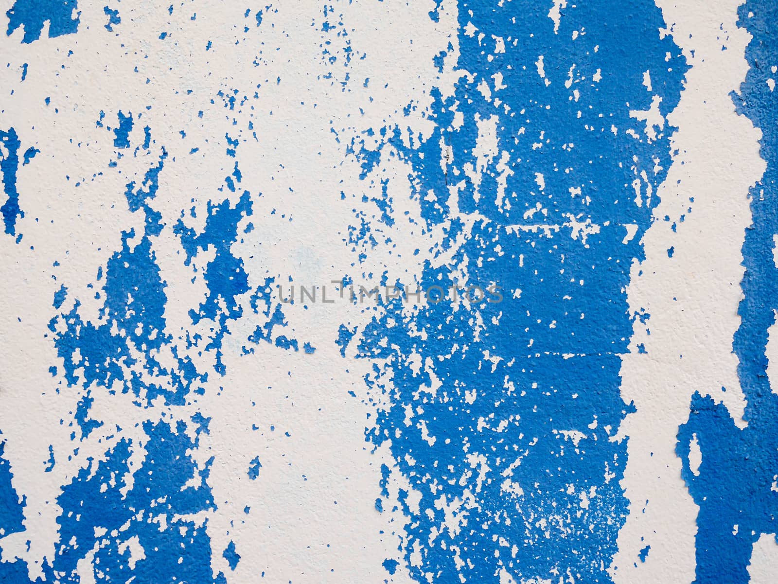 Old peeling paint on wall background texture