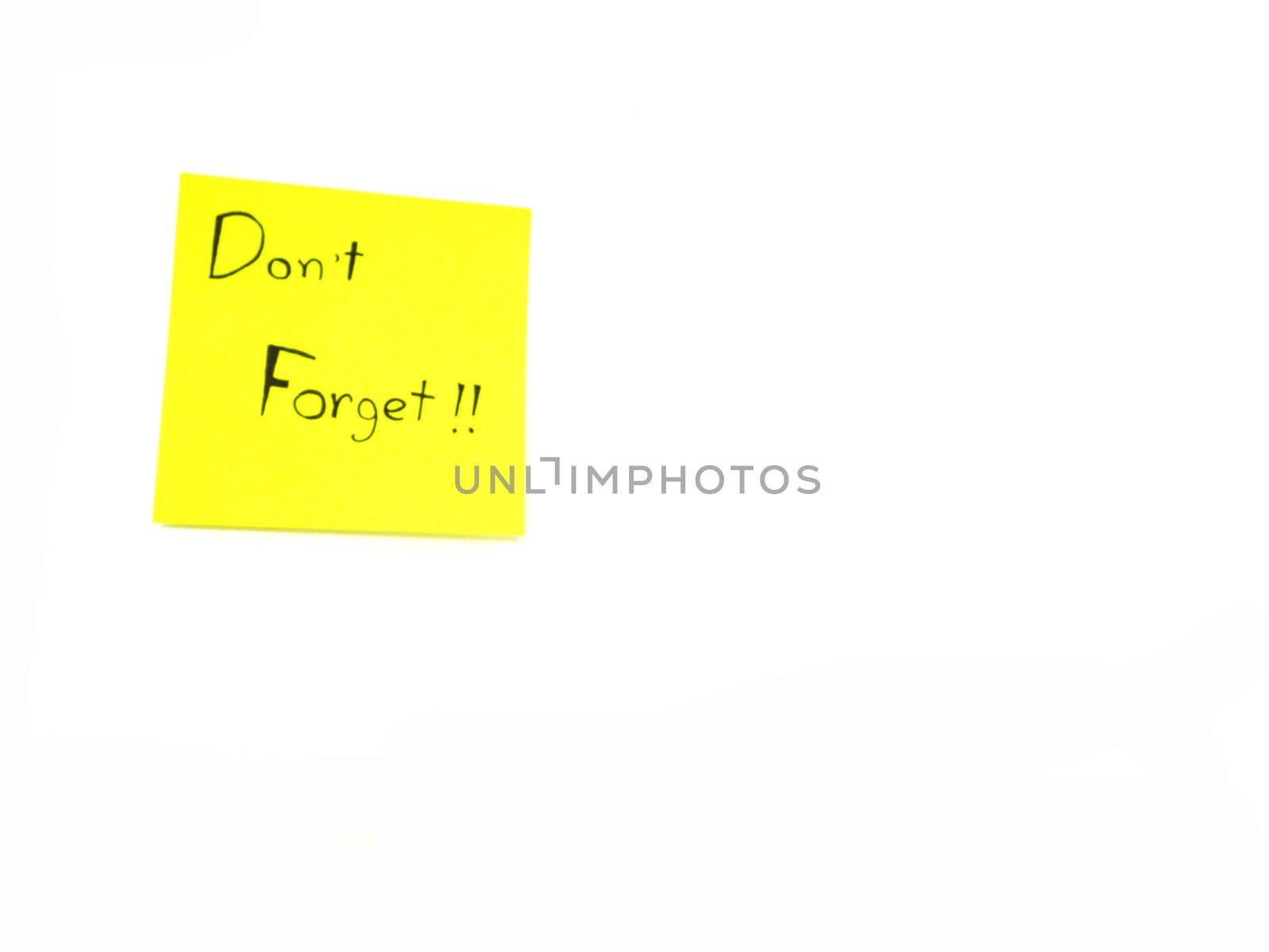 Don't forget in post it note  on white background with copy space
