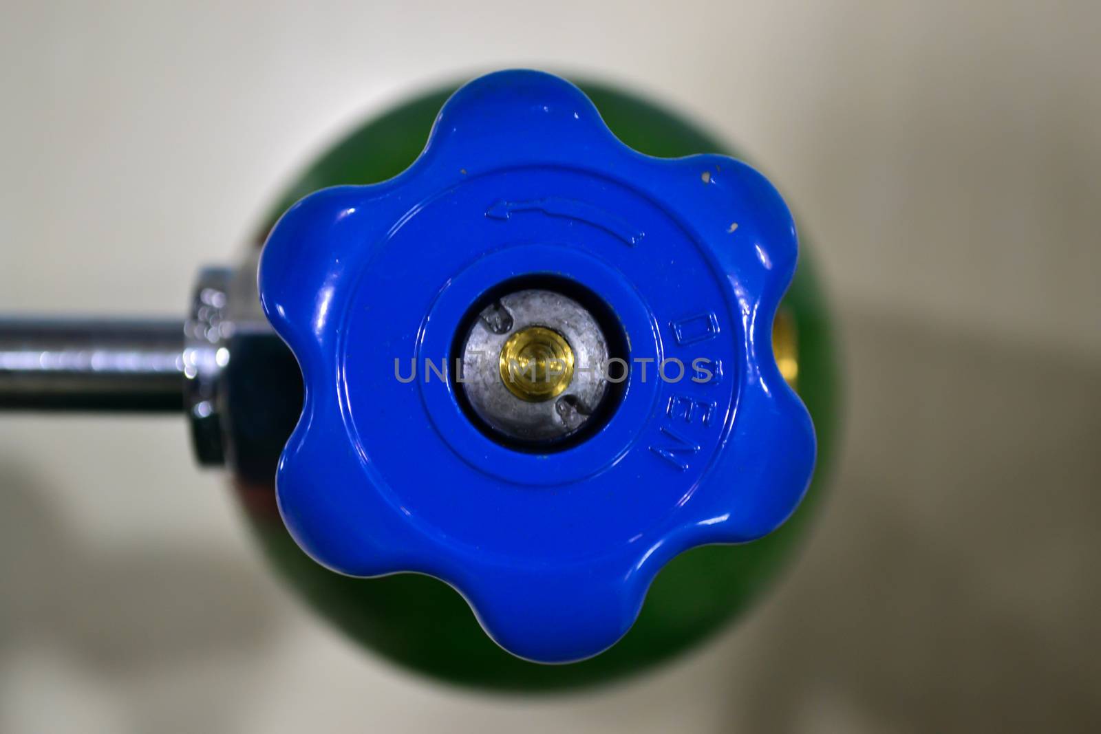Close up blue valve pressure in hospital