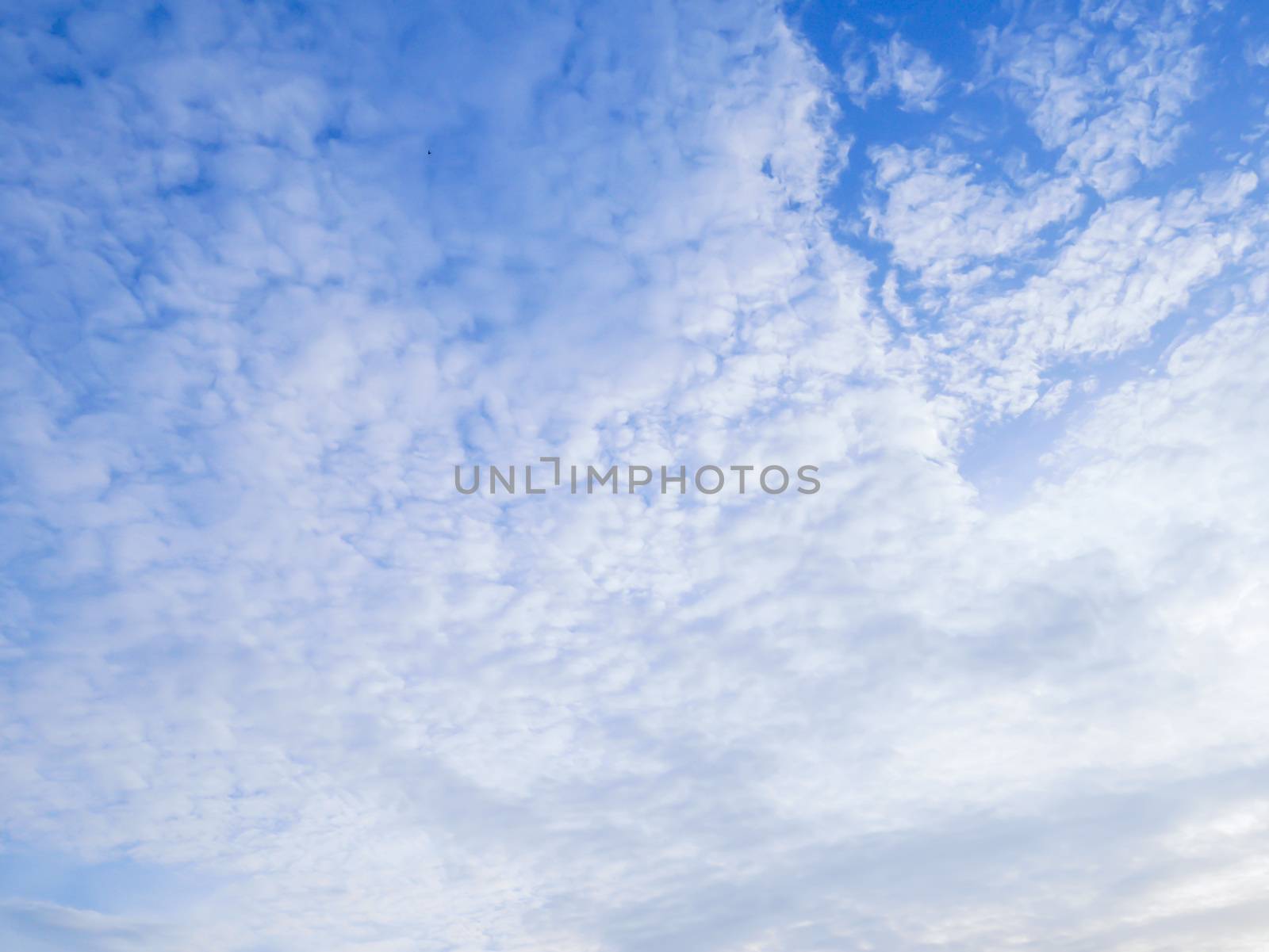 Many clouds on blue sky background