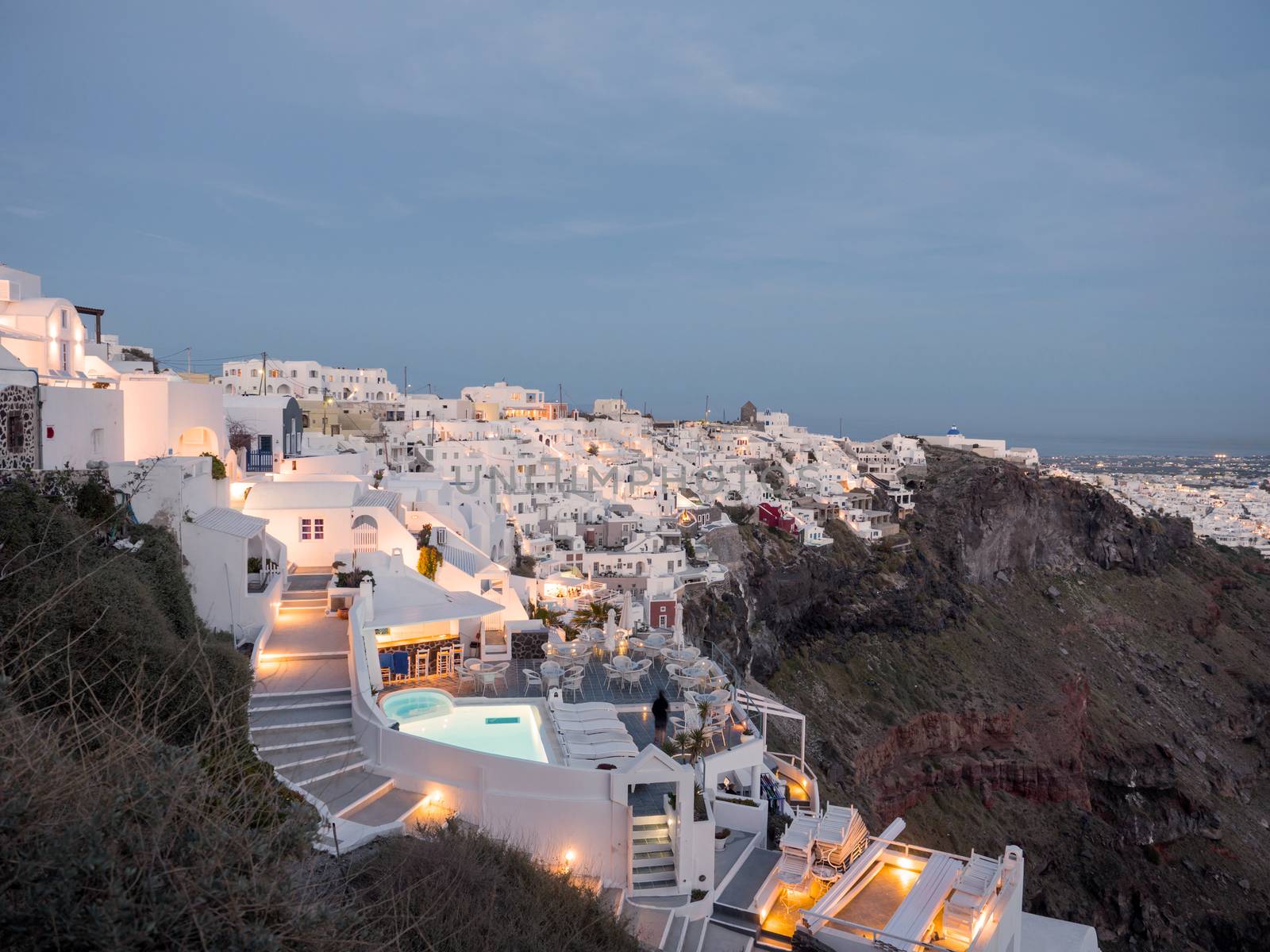 The small white houses with lights late in the afternoon in Santorini island in Cyclades,Greece