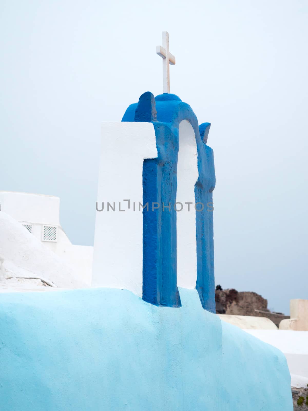 Traditional roof top of small church in Santorini, Greece