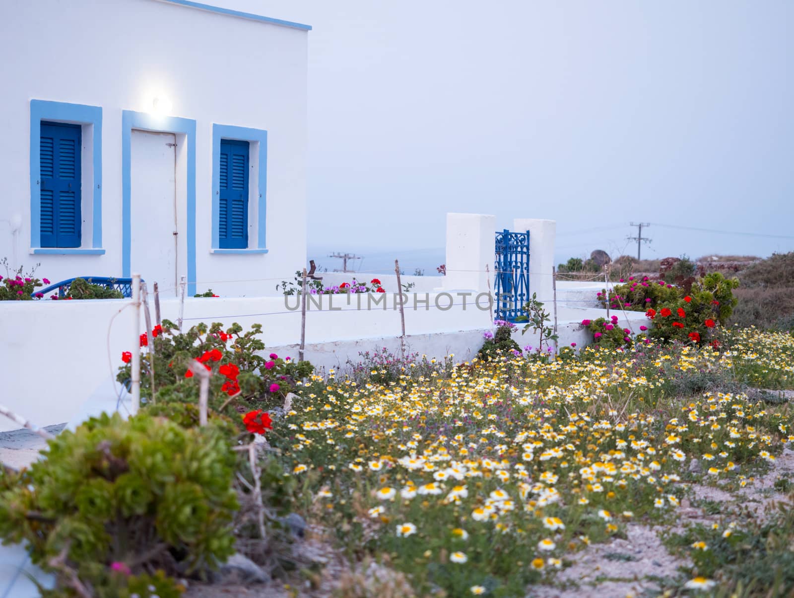 Small traditional white houses in Santorini island, Greece