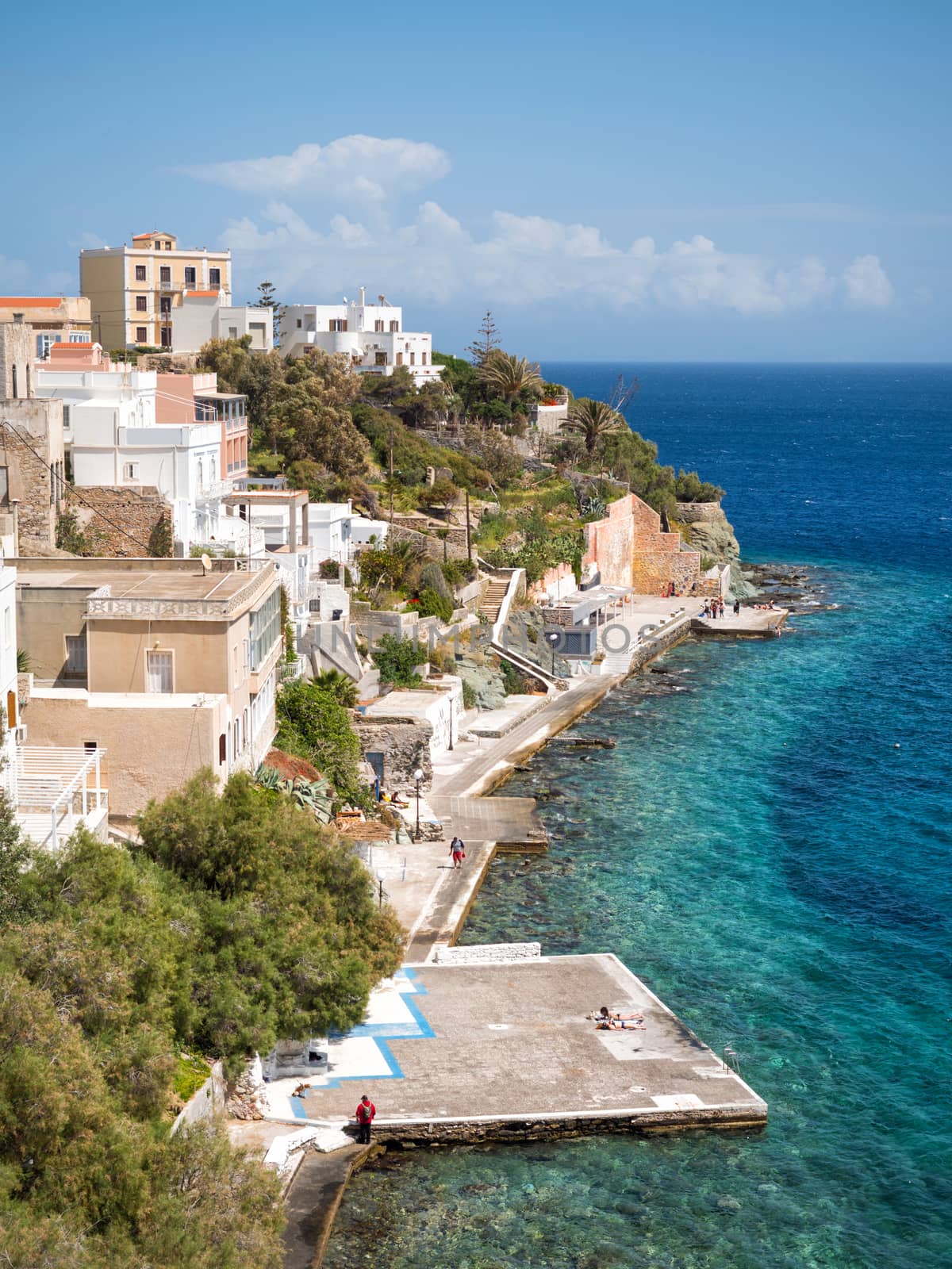 View of Syros town with beautiful buildings and houses  in a sunny day