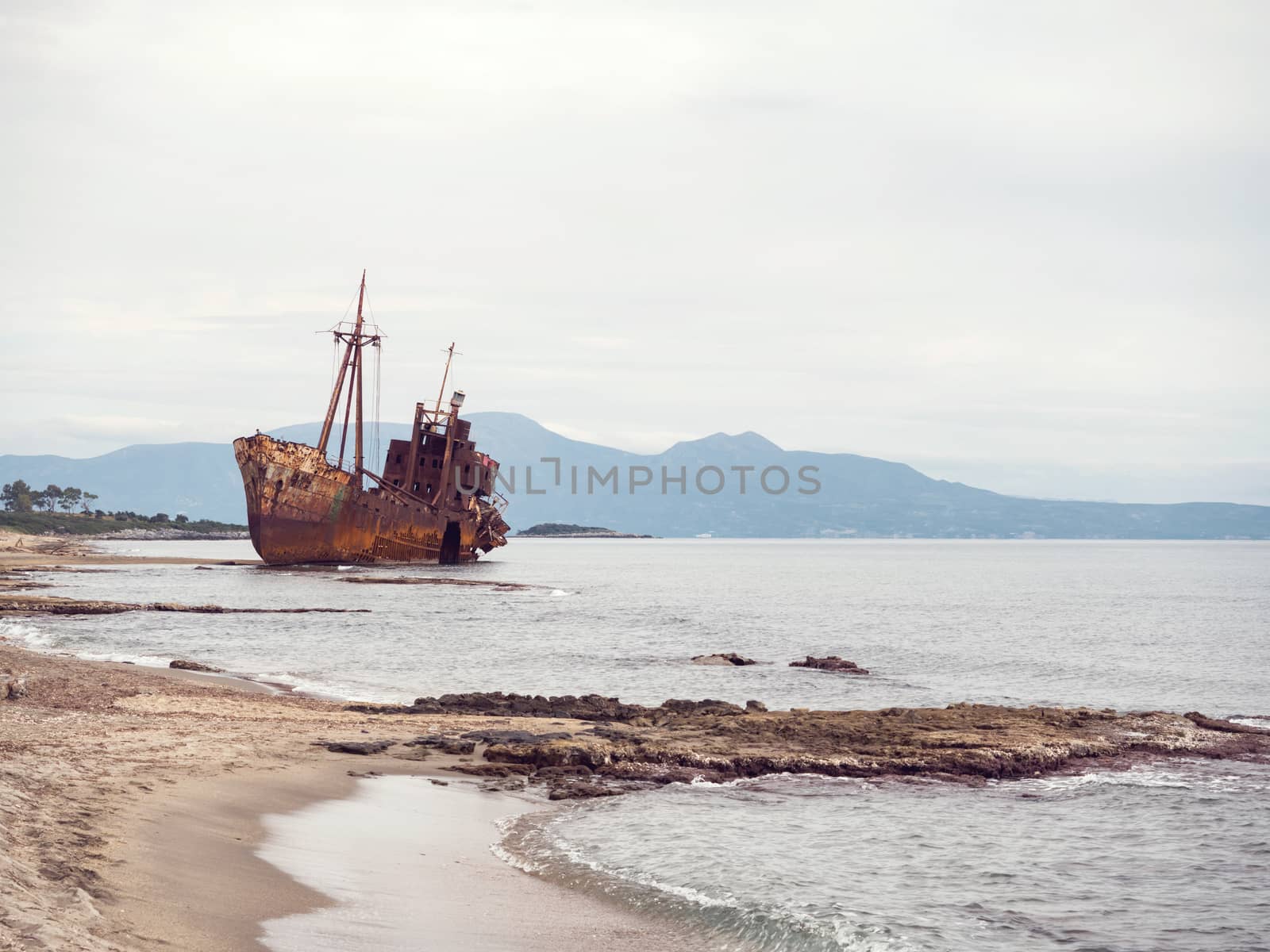 Small shipwreck on the beach left there for years, Gytheio, Greece