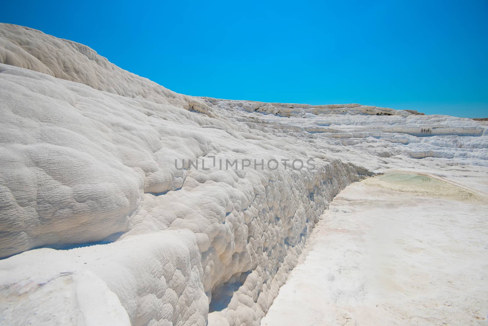 Panoramic view of Pammukale near modern city Denizli, Turkey. One of famous tourists place in Turkey.