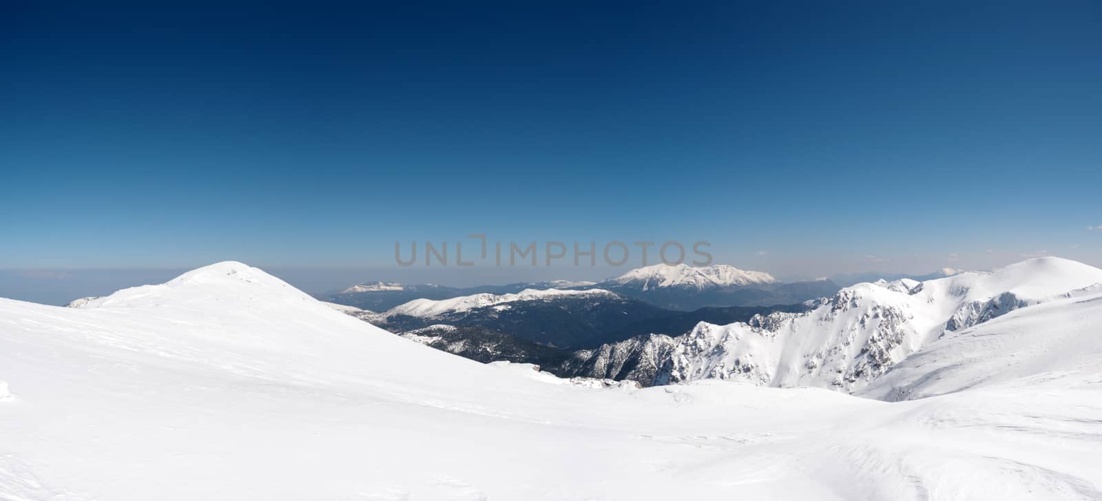 Landscape of Helmos mountain covered with snow in a sunny day,Kalavrita,Greece