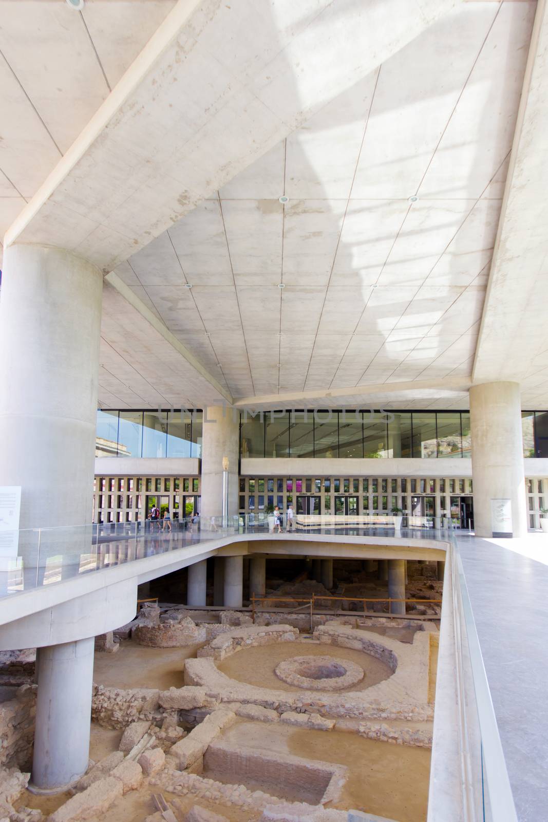 ATHENS, GREECE - MAY 13, 2014: The entrance of Acropolis museum with ruins underneath