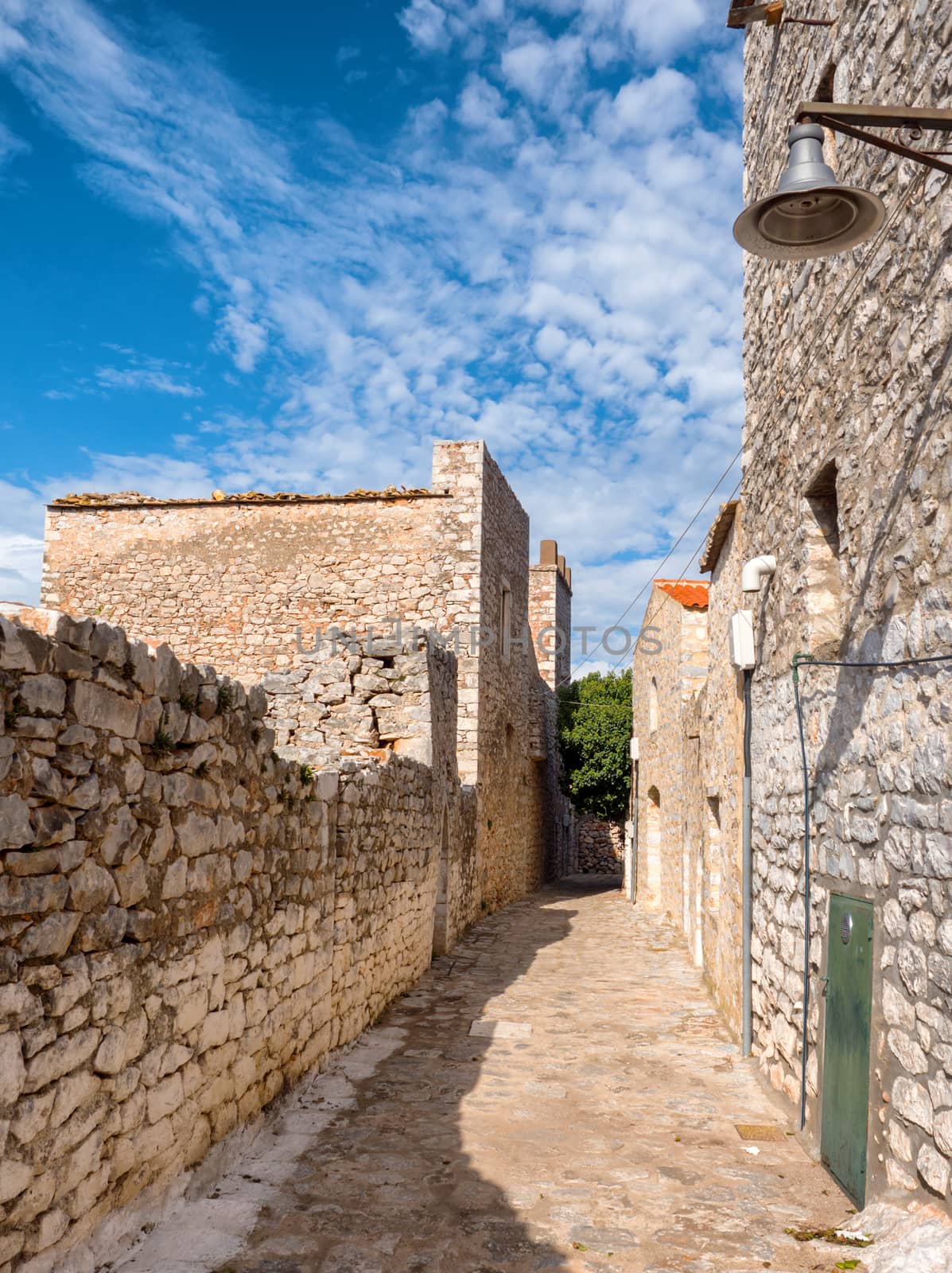 Stone alley in the traditional village of Aeropolis,
Laconia, Peloponnese, Greece