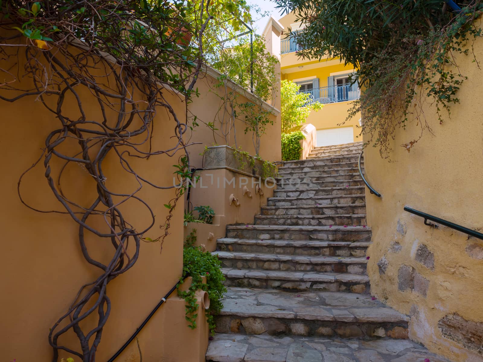 Beautiful alley with stairs in Assos village, Kefalonia, Ionian Islands, Greece