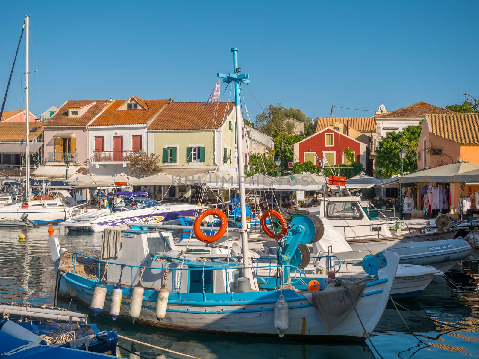 FISKARDO, GREECE - AUGUST 20, 2016: Fishing boats in the port of Fiskardo village Kefalonia island