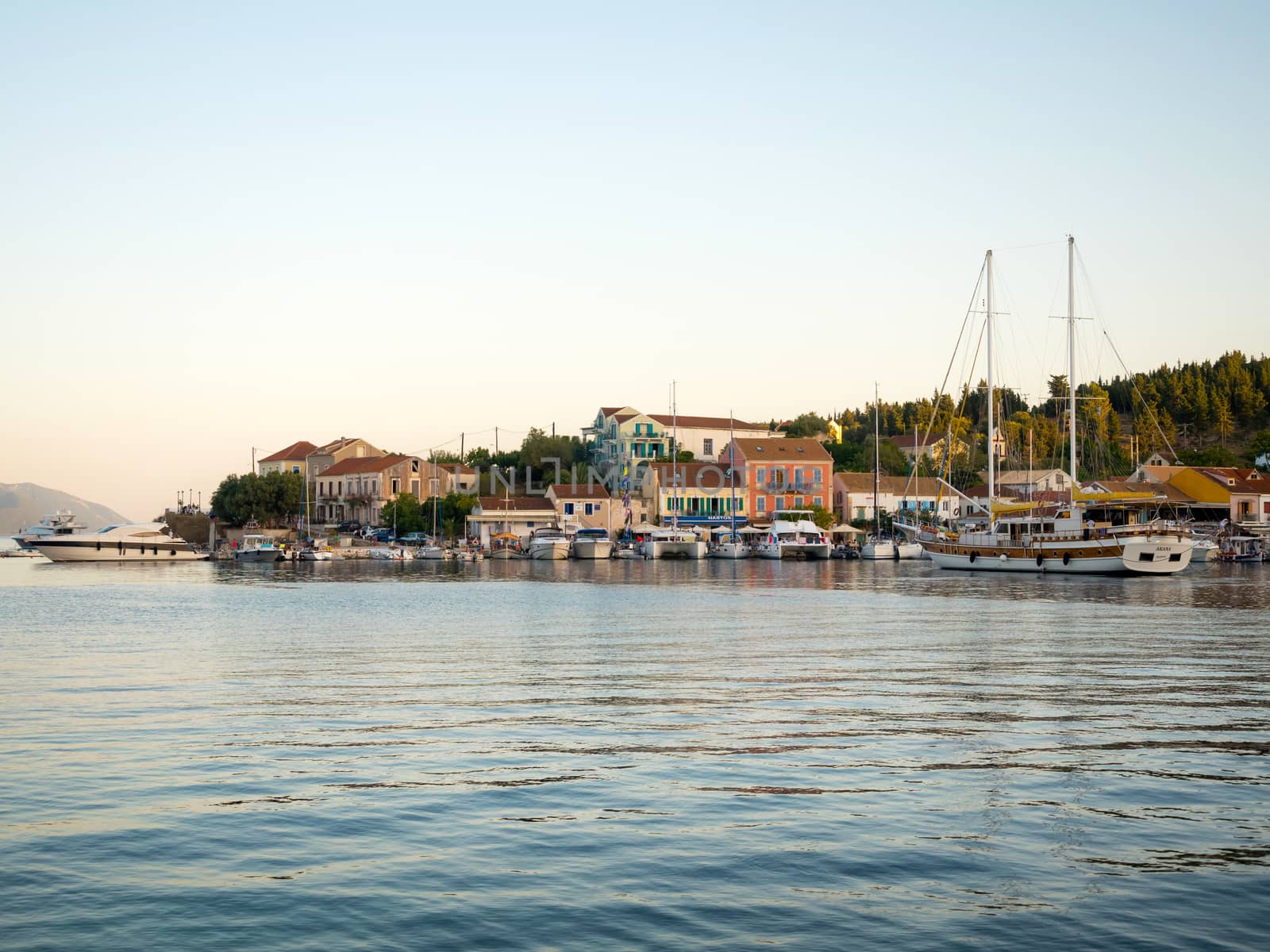 FISKARDO, GREECE - AUGUST 20, 2016: The port of Fiskardo village in Kefalonia island