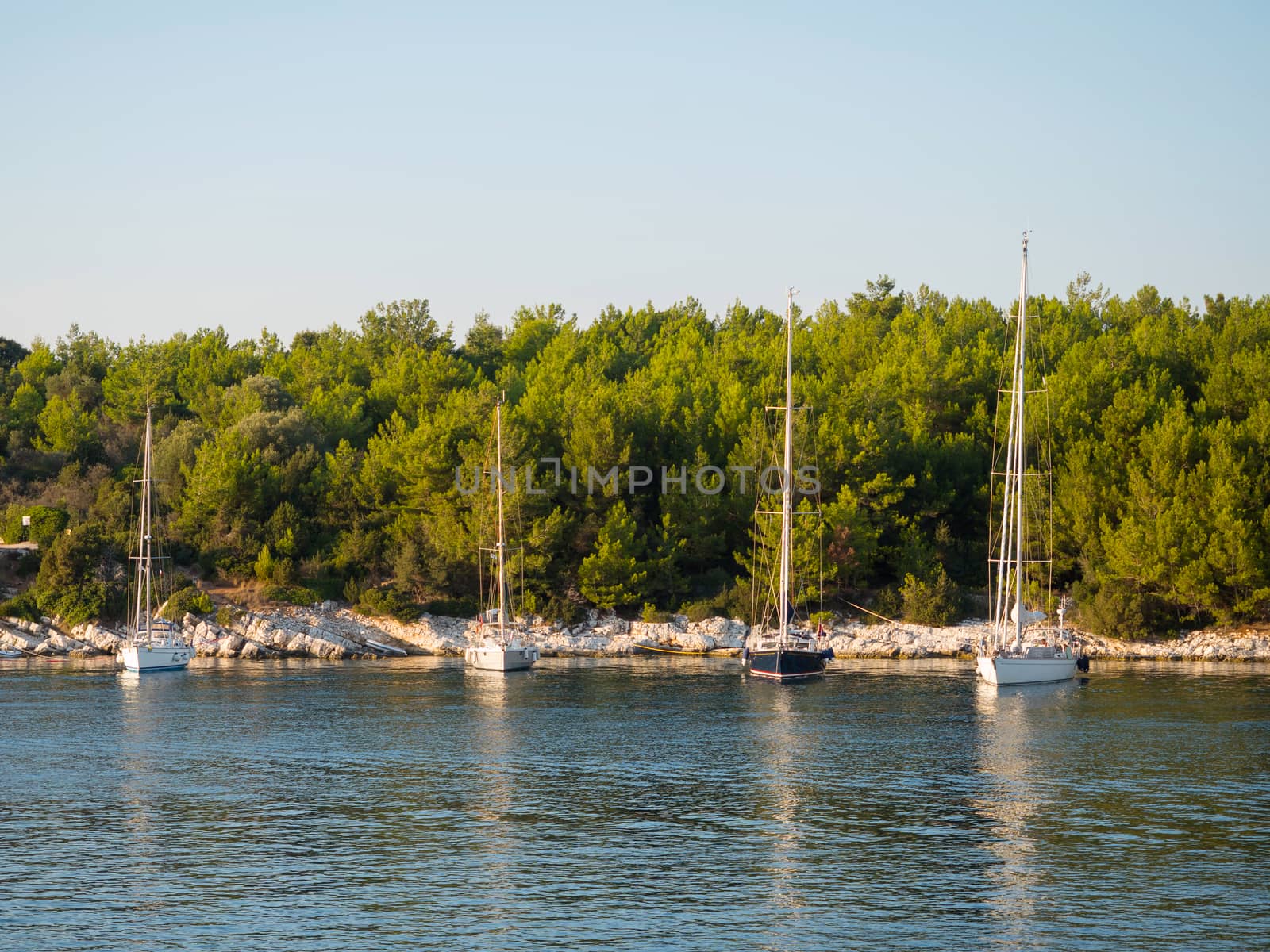 Sail boats in the port of Fiskardo village in Kefalonia island, Greece