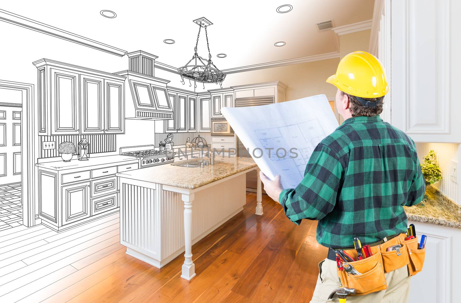 Male Contractor with Hard Hat and Plans Looking At Custom Kitche by Feverpitched