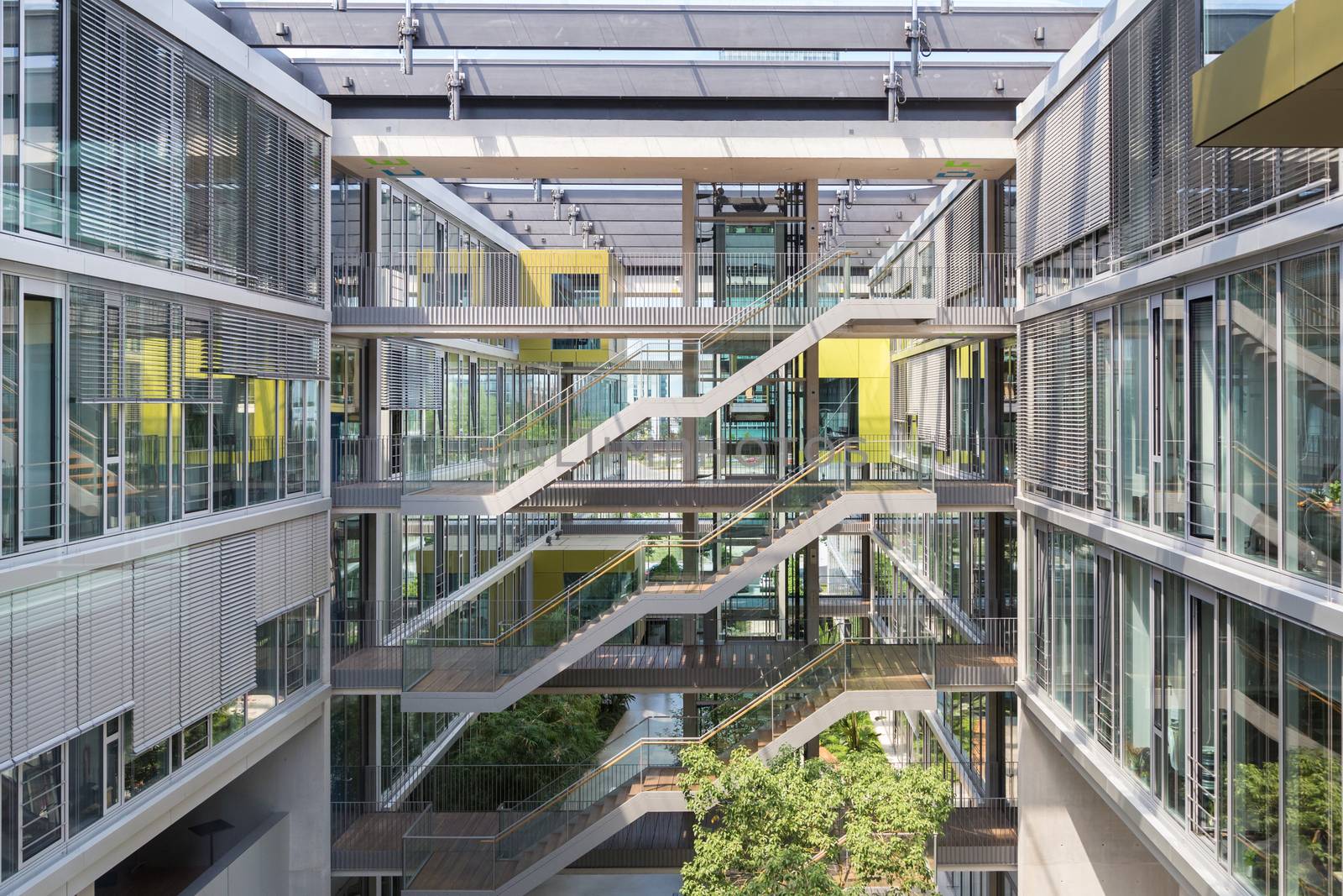 Main hall, staircase and windows of morden office building. Contemporary corporate business architecture.