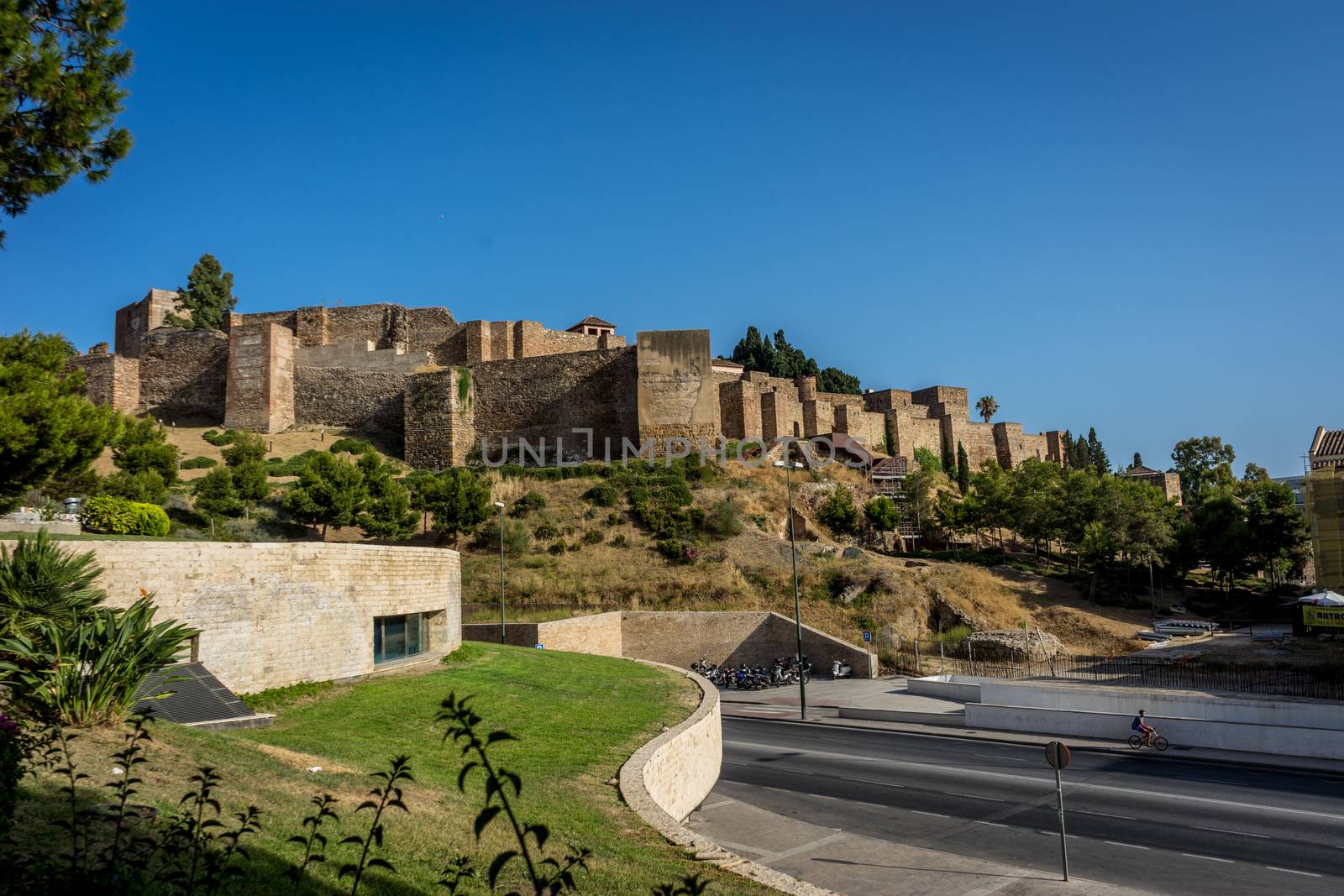 Gibralfaro castle (Alcazaba de Malaga), Malaga, Costa del Sol, Spain, Europe on a bright summer day with blue sky