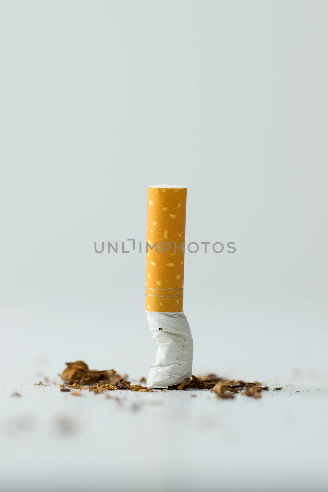 Quit smoking concept by breaking the cigarette by Kenishirotie