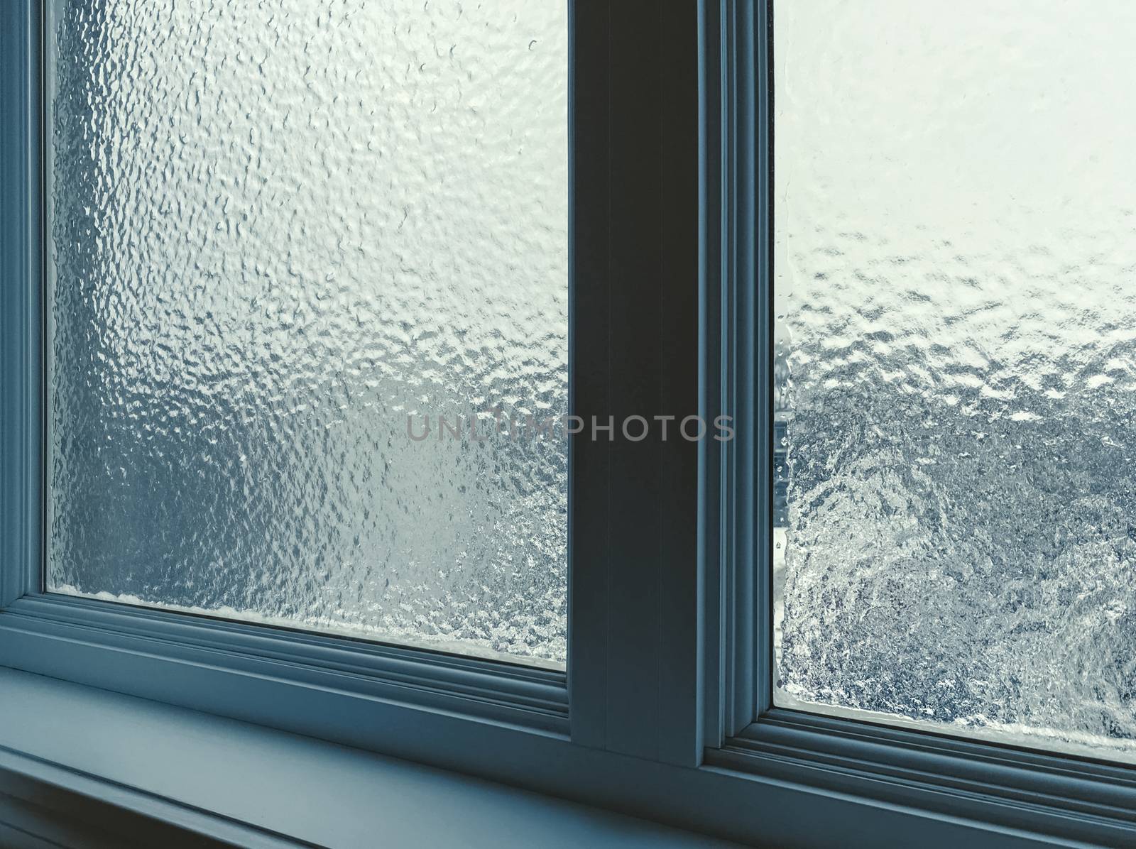 Window frosted after freezing rain by anikasalsera