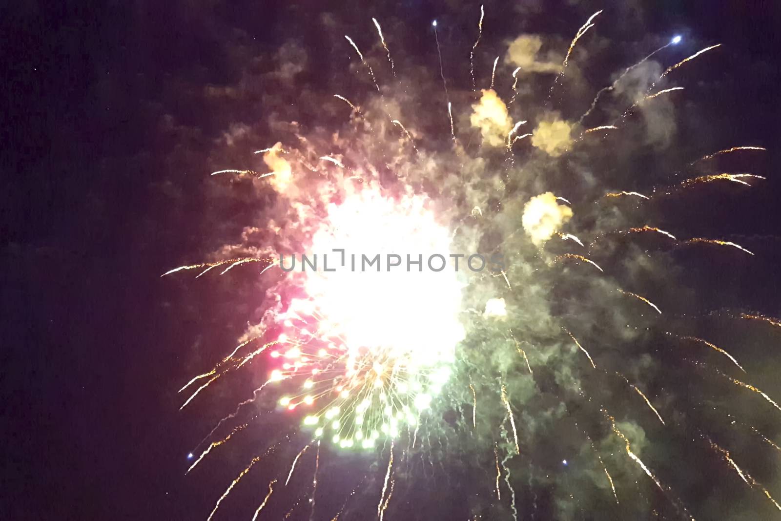 Festive salute in the night sky. Explosions of fireworks by nyrok