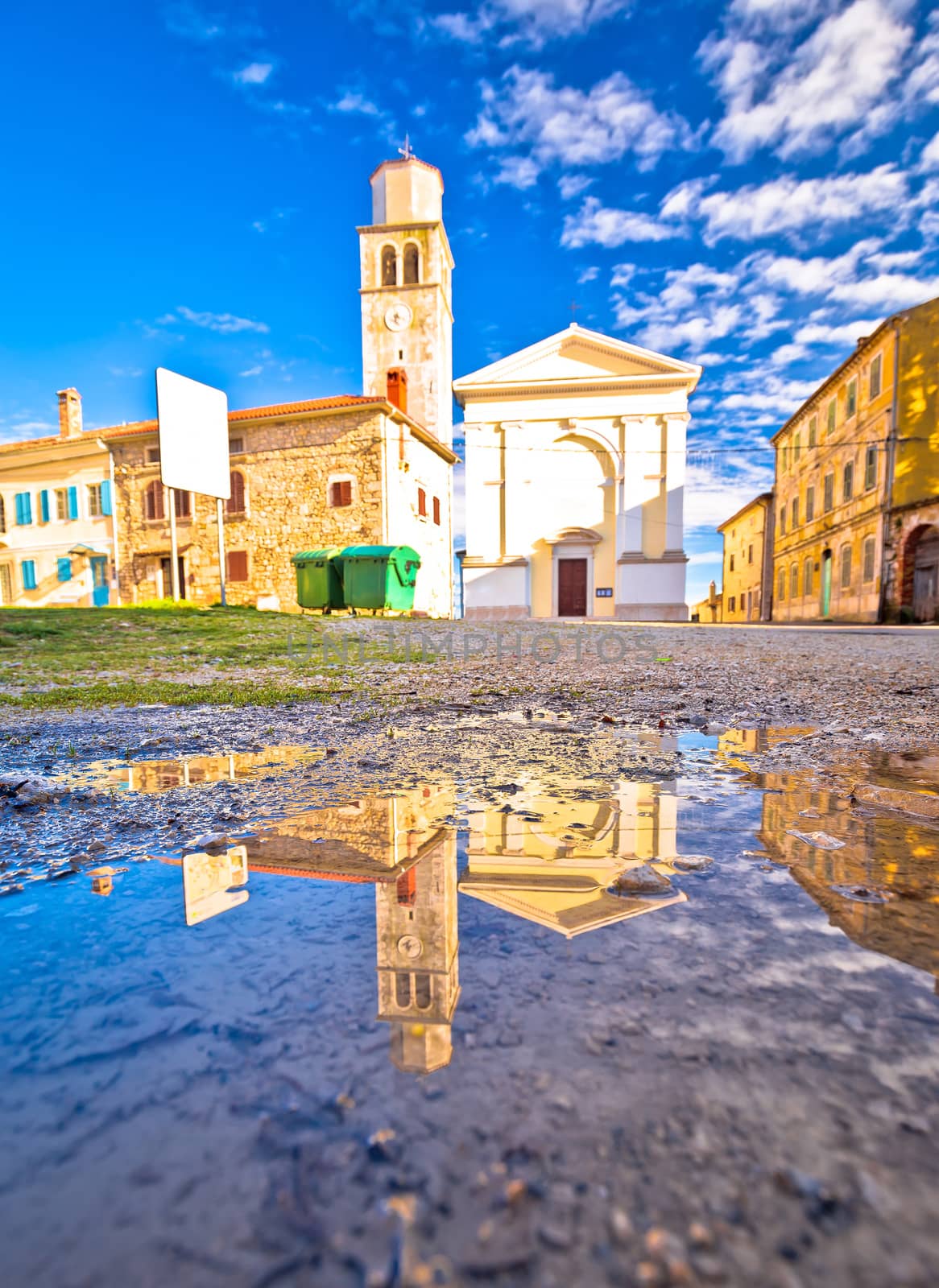 Town of Vizinada old cobbled square water reflection view, Istria region of Croatia