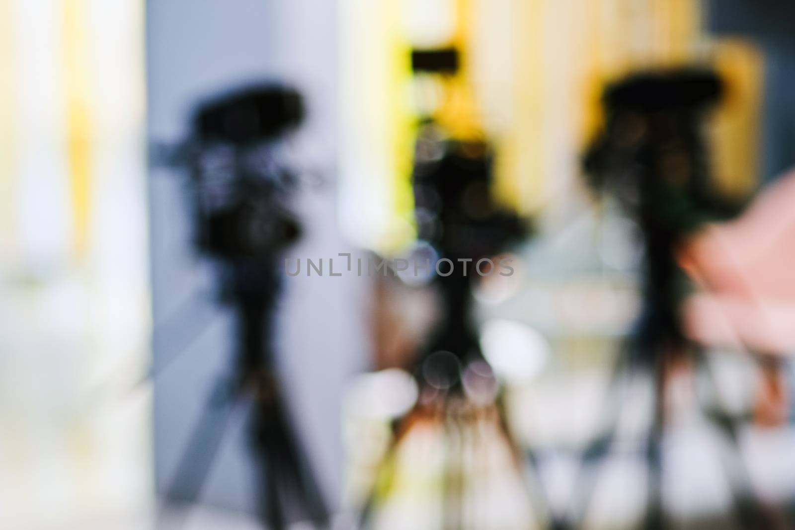 Abstract blurred background of video camera shooting  in studio, recording movie production
