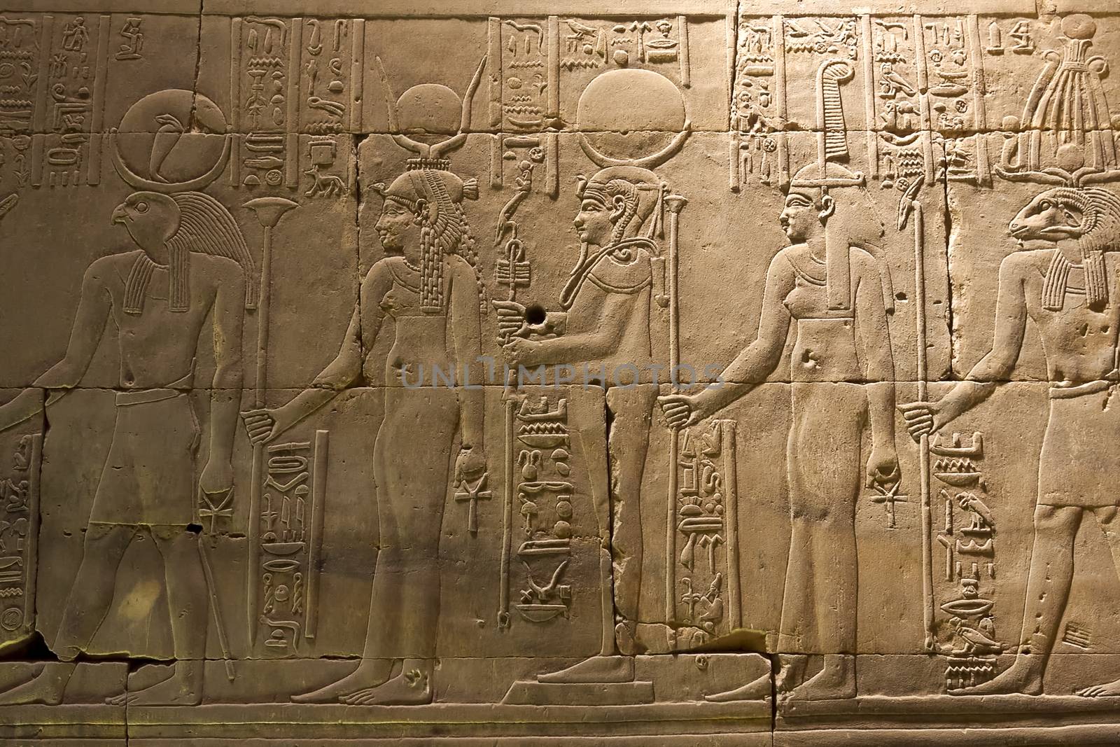 Egyptian hieroglyphs and drawings on the walls and columns. Egyptian language, The life of ancient gods and people in hieroglyphics and drawings