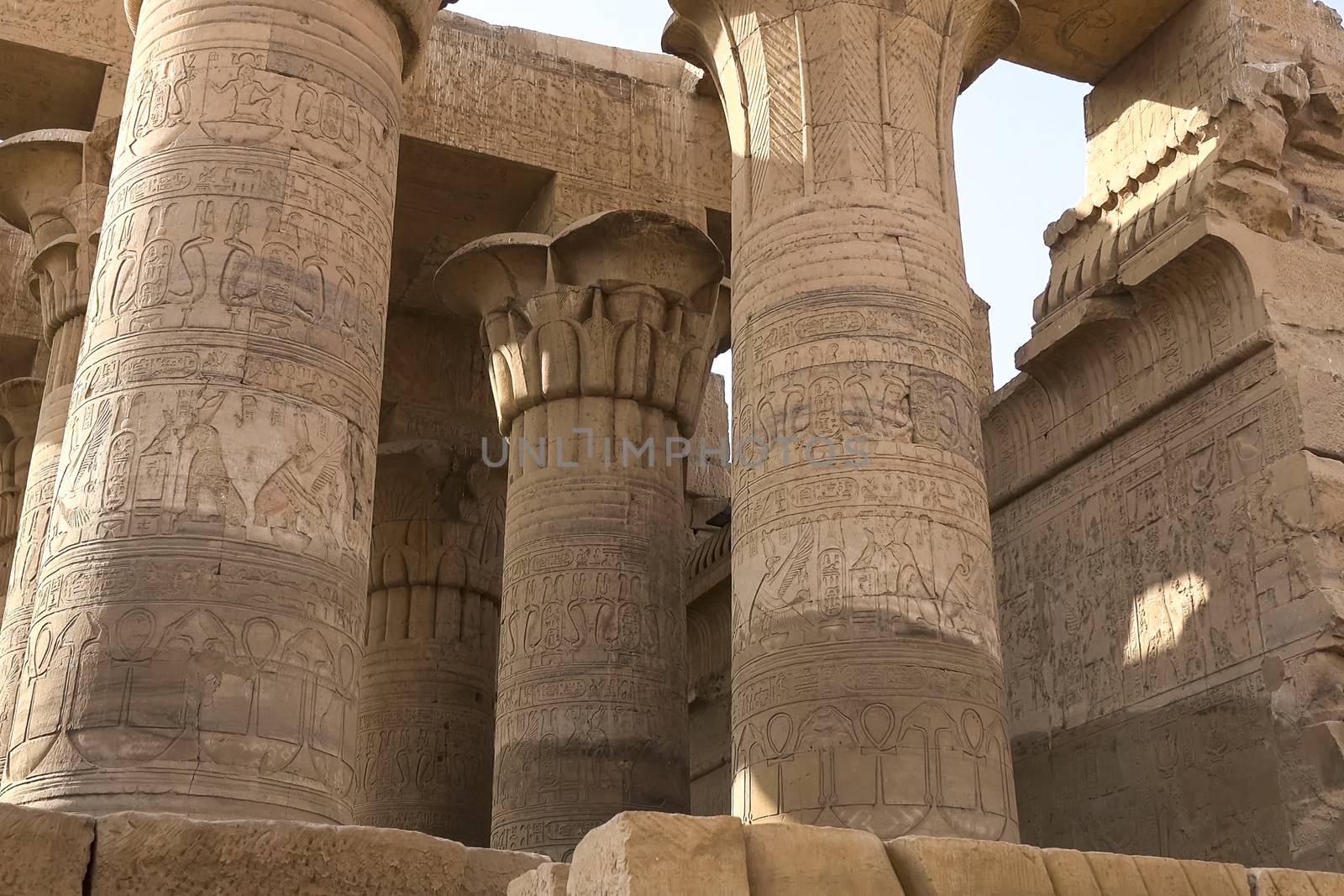 Egyptian hieroglyphs and drawings on the walls and columns. Egyptian language, The life of ancient gods and people in hieroglyphics and drawings