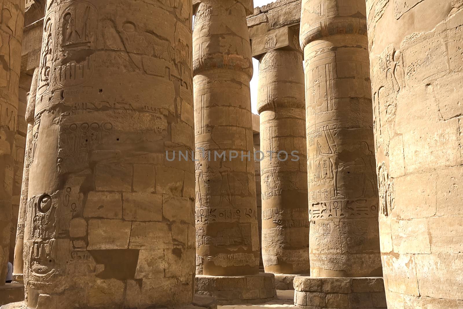 Egyptian hieroglyphs and drawings on the walls and columns. Egyptian language, The life of ancient gods and people in hieroglyphics and drawings