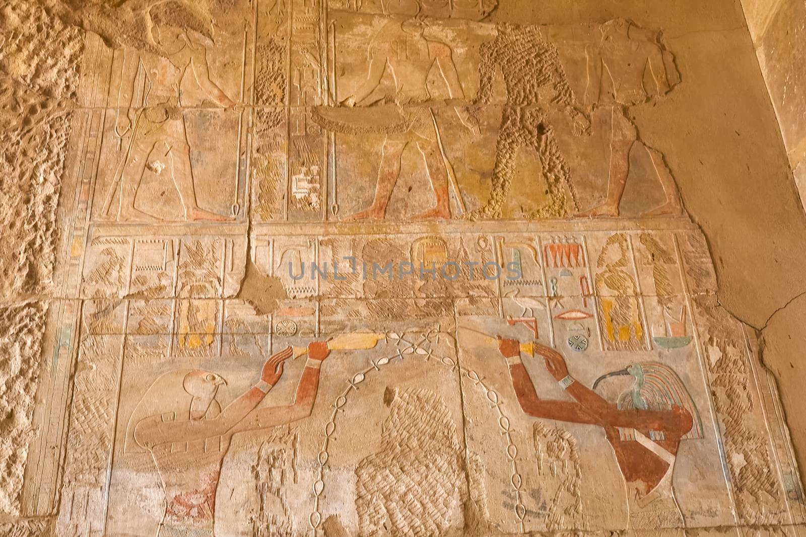 Egyptian hieroglyphs and drawings on the walls and columns. Egyptian language, The life of ancient gods and people in hieroglyphics and drawings. by nyrok