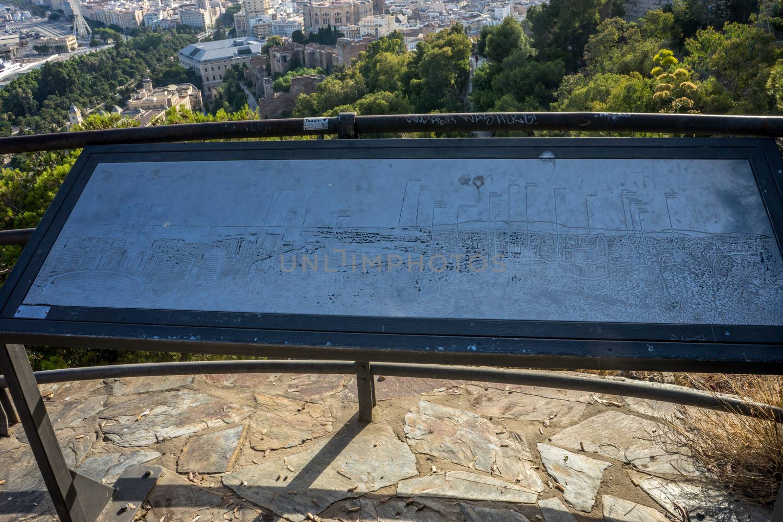 Cityscape of Malaga on a metal plat at the view point in Malaga, by ramana16