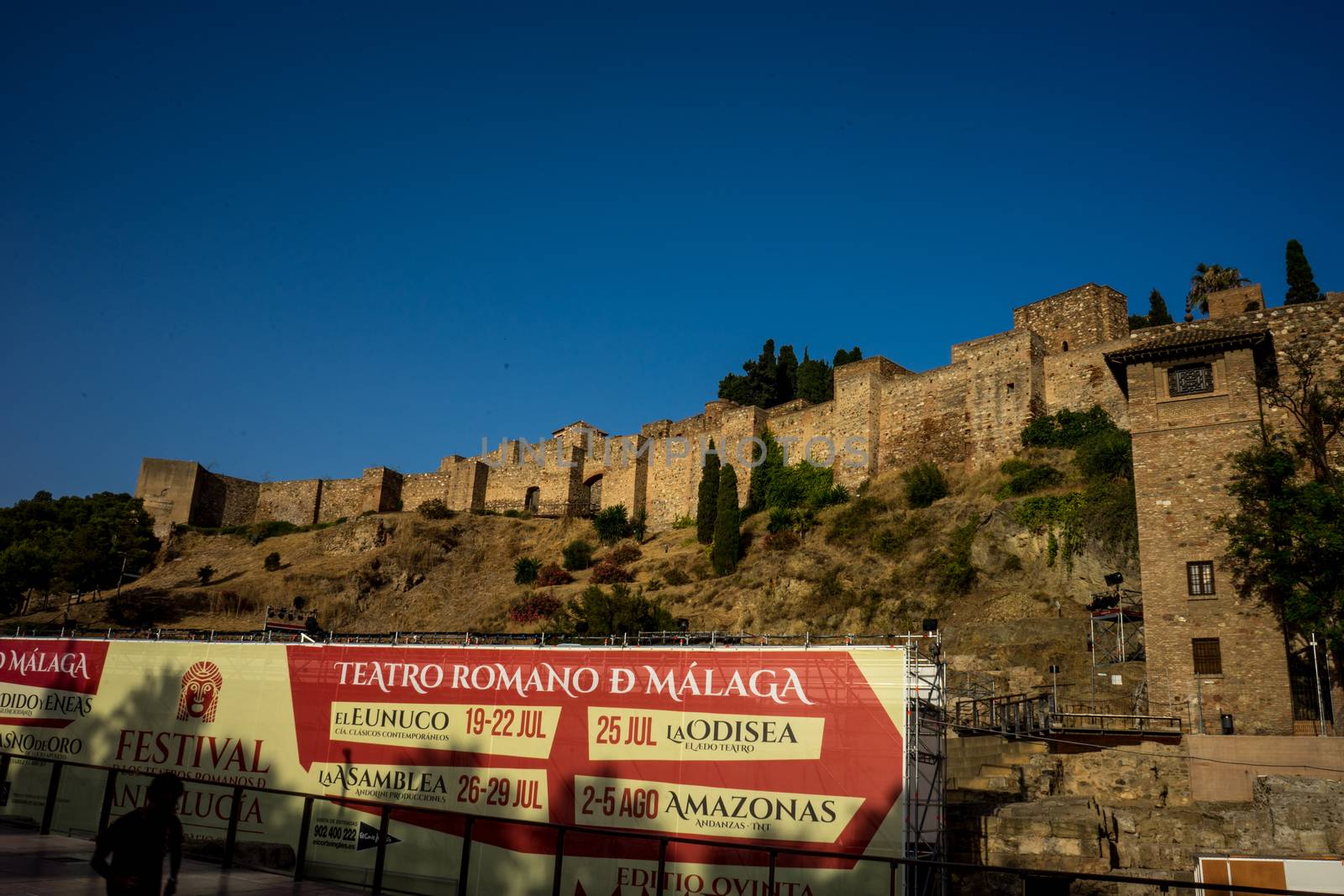 Roman theater, Malaga, Costa del Sol, Spain, Europe on a bright summer day with blue sky