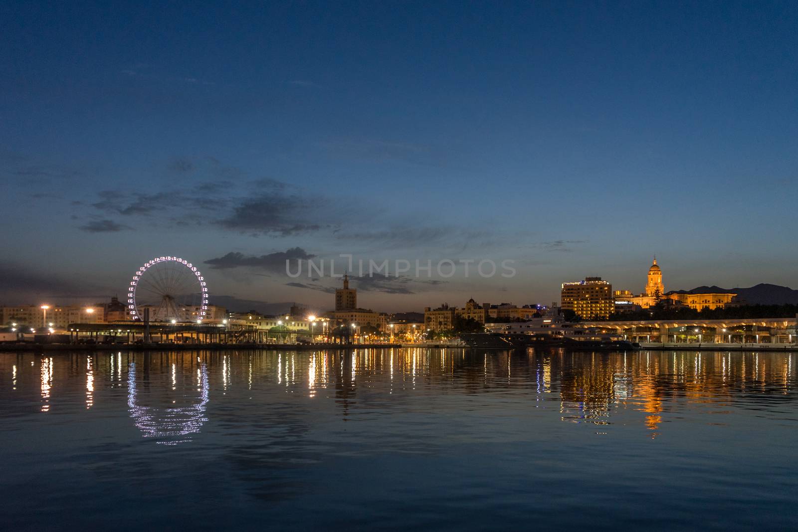 View of malaga city from harbour, Malaga, spain, Europe at golden sunset hour