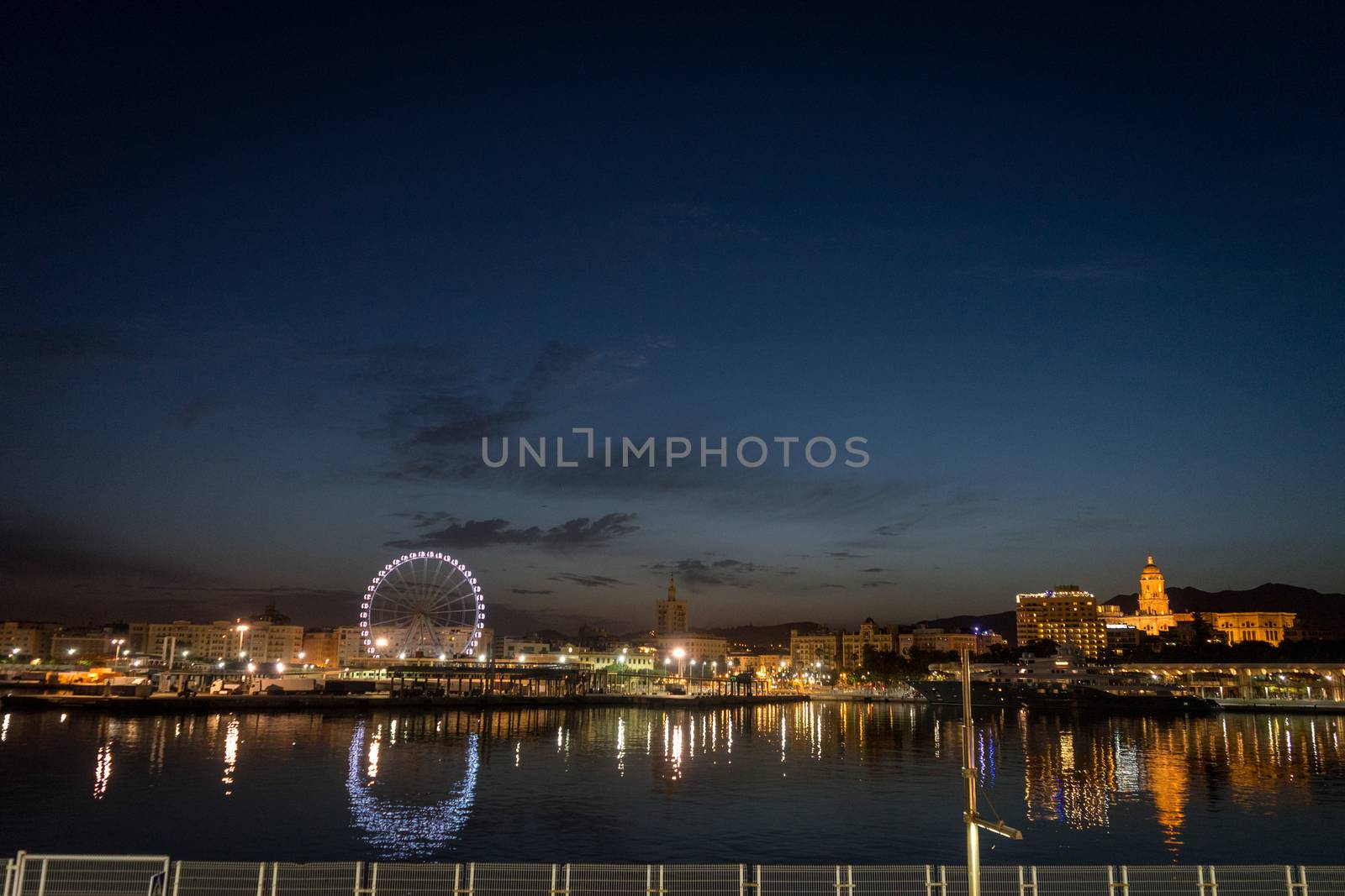 View of malaga city from harbour, Malaga, spain, Europe at golden sunset hour