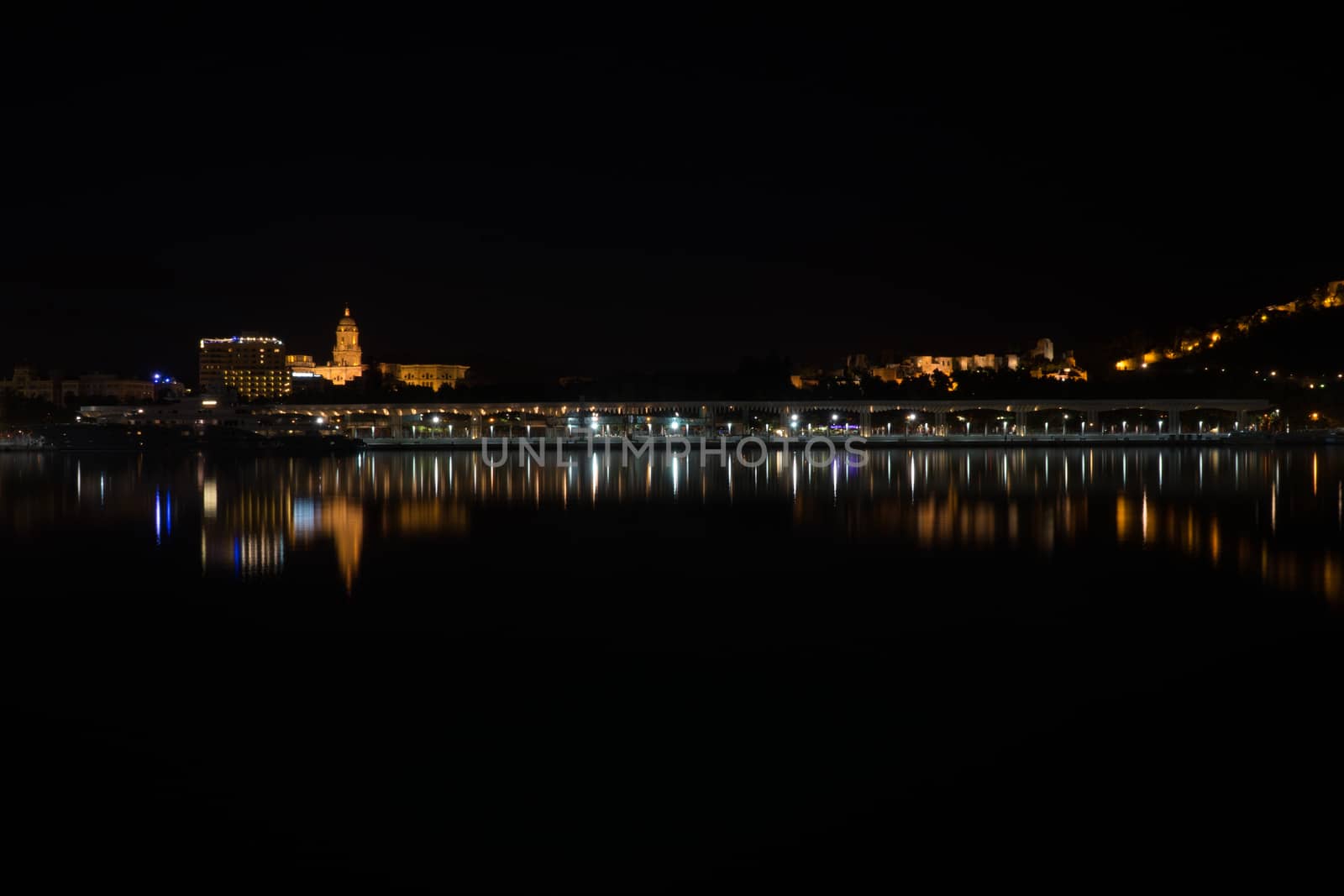 View of Alcazaba from harbour, Malaga, spain, Europe at night