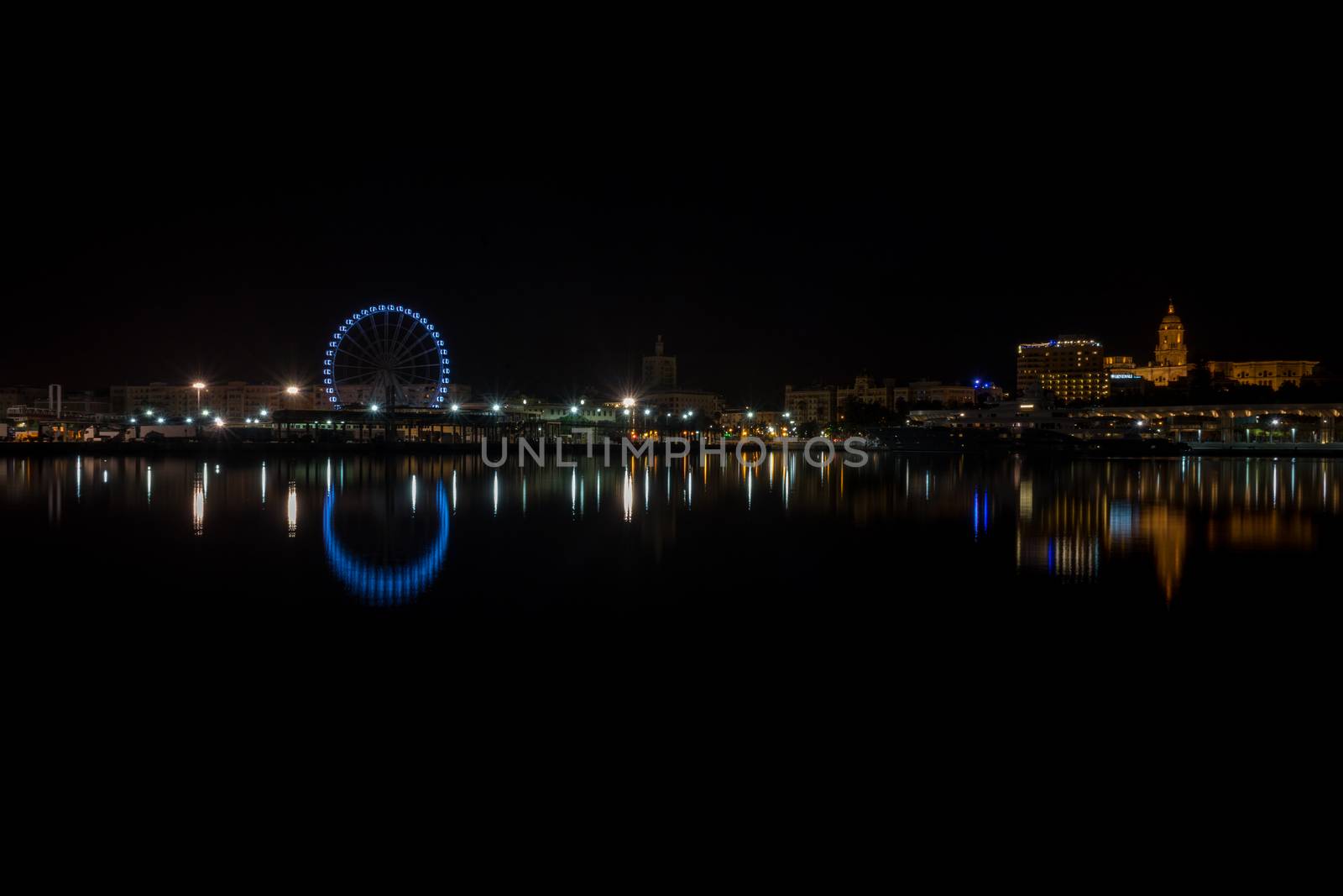 View of Malaga city from harbour, Malaga, spain, Europe at night with illuminations