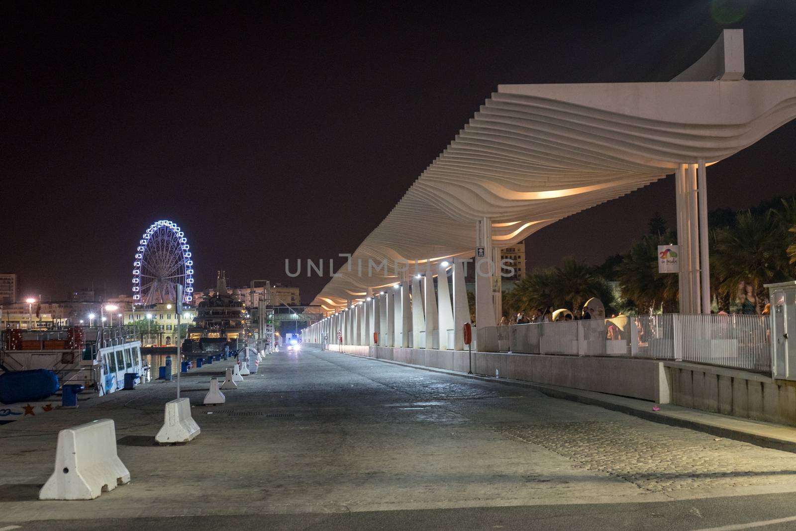 The walking path illuminated with the giant wheel with light and by ramana16