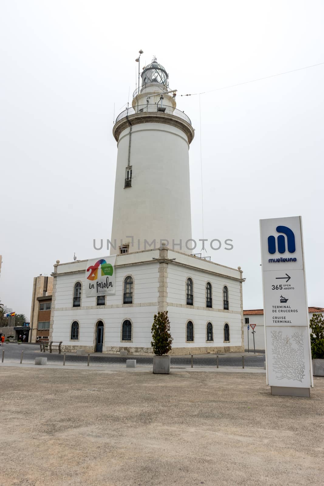 The lighthouse at Malagueta beach in Malaga, Spain, Europe  by ramana16