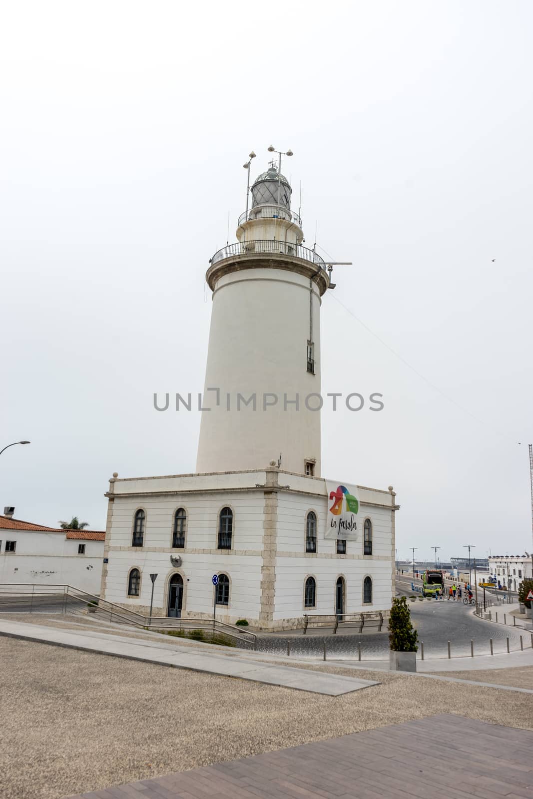 The lighthouse at Malagueta beach in Malaga, Spain, Europe  by ramana16