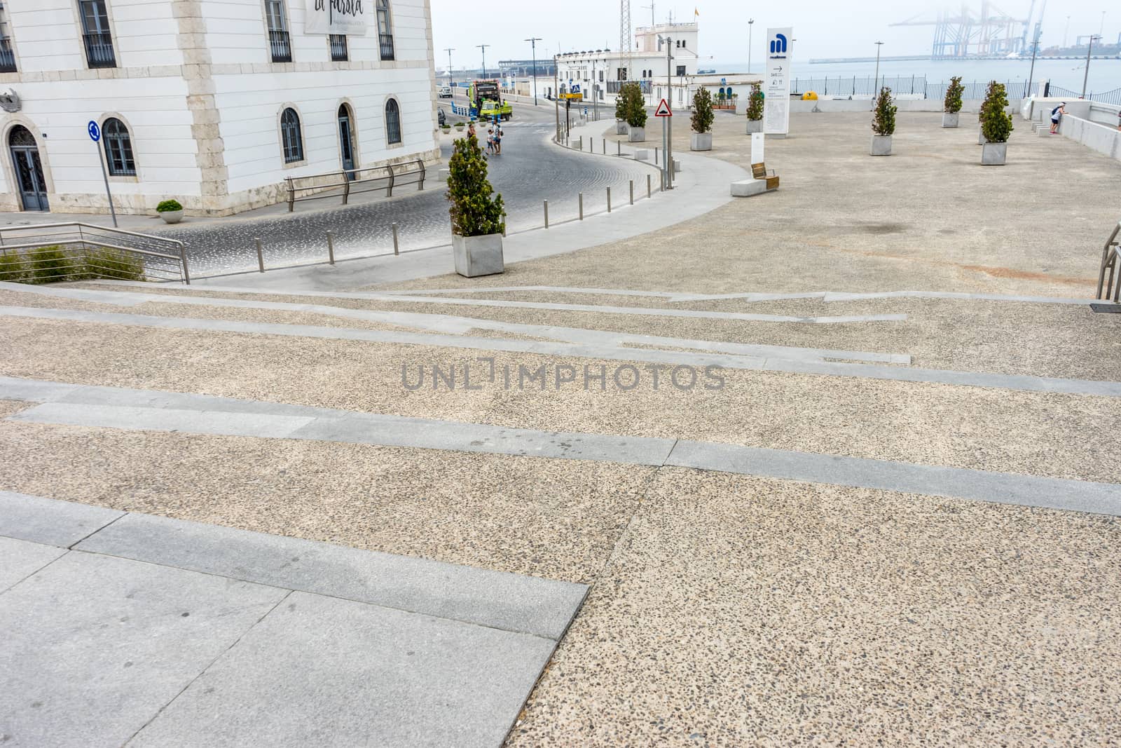 Stone steps along the Malagueta beach at Malaga, Spain, Europe on a cloudy morning