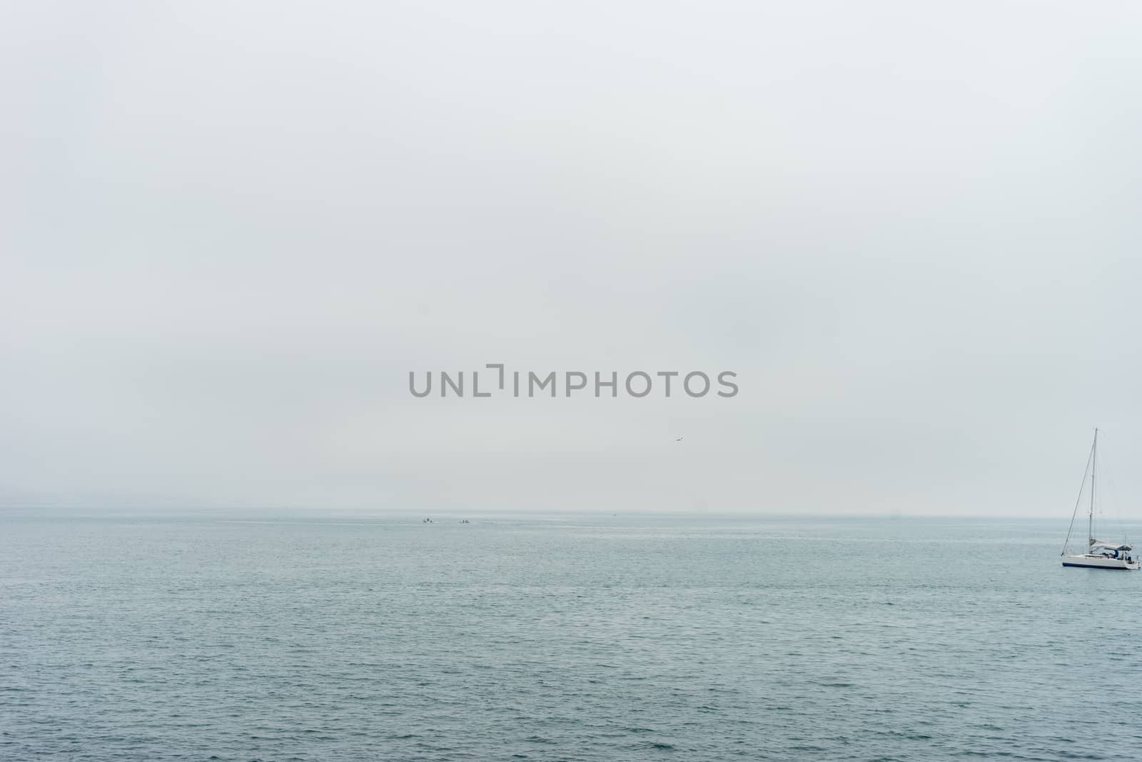 A lonely boat in the sea at Malaga, Spain, Europe on a cloudy morning